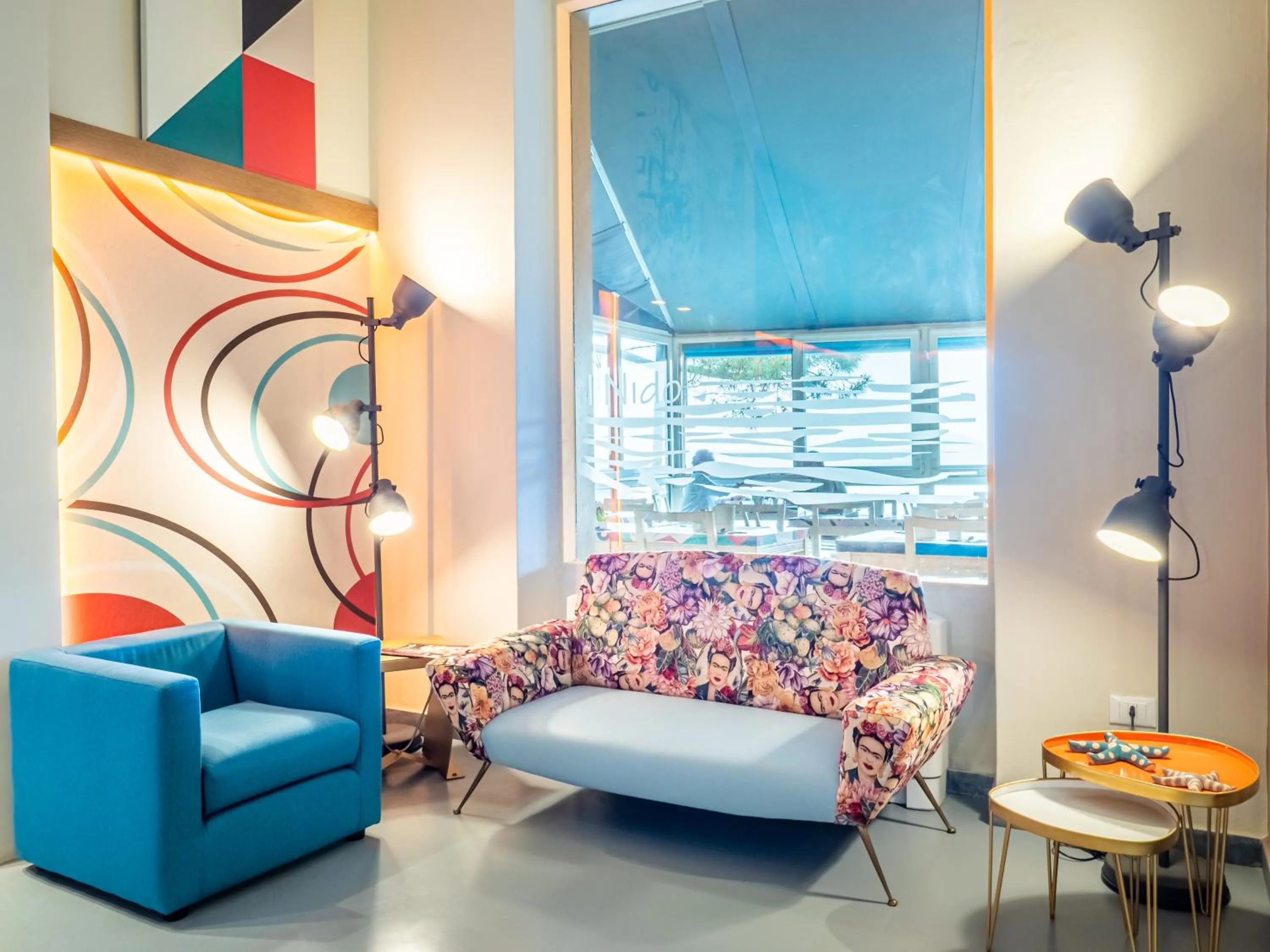 Communal lounge/ TV room in Hotel Il Nido