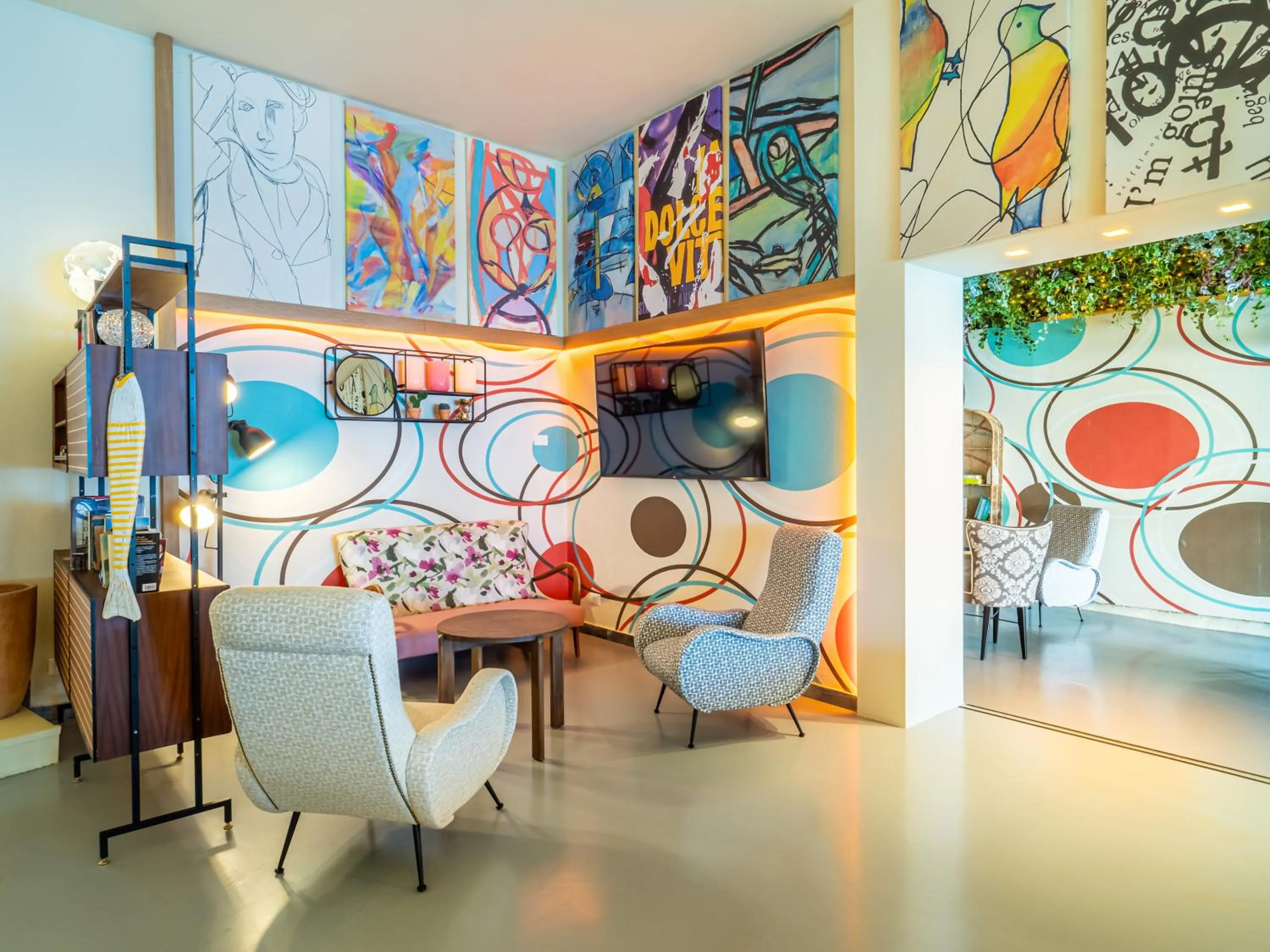 Communal lounge/ TV room in Hotel Il Nido