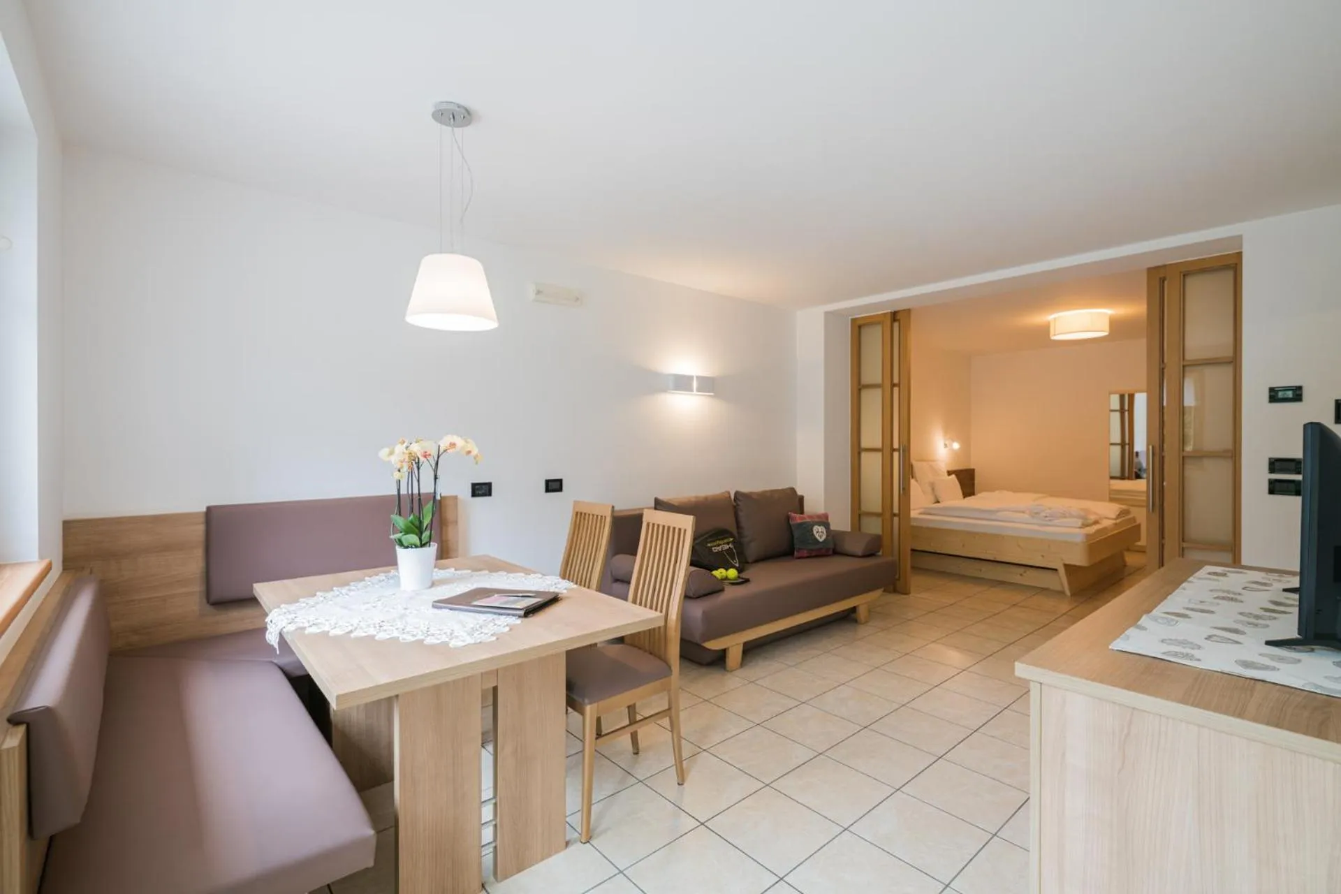 Seating area, Bed in Residence Plan De Corones