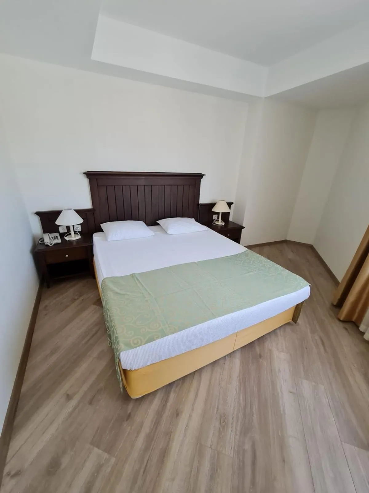 Bed in Side Palm D'or Hotel