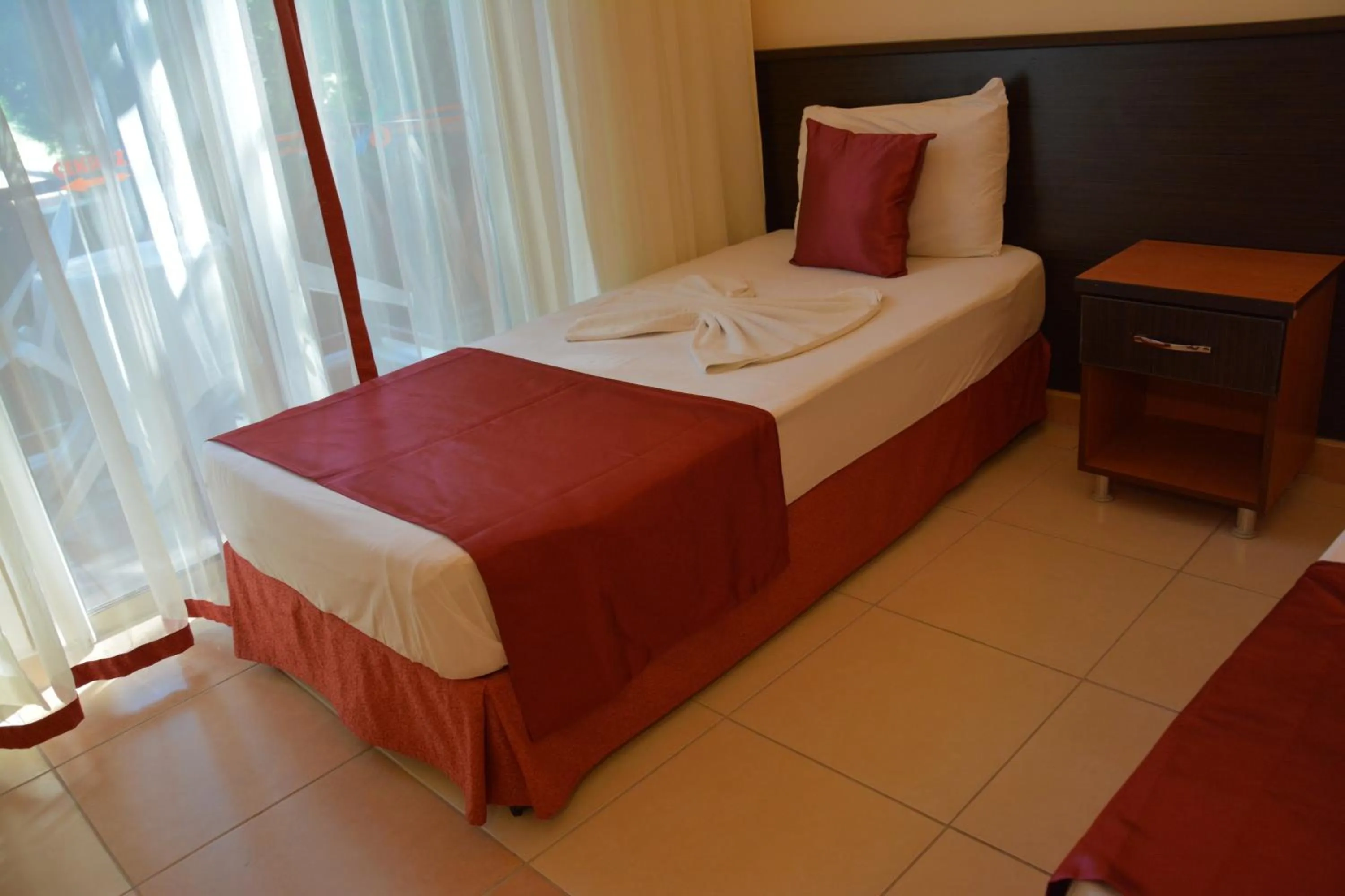 Bed in Yavuzhan Hotel