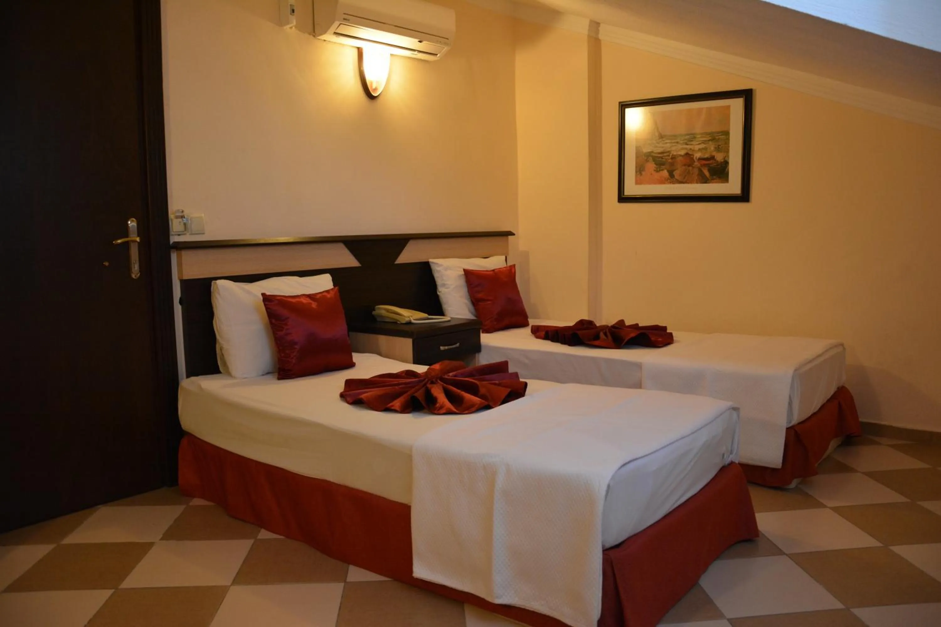 Bed in Yavuzhan Hotel