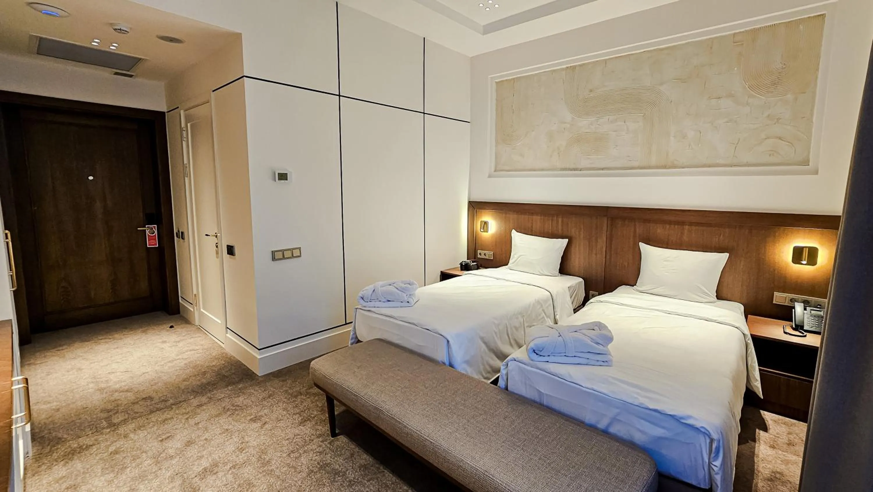 Bed in Grand Tien Shan Hotel