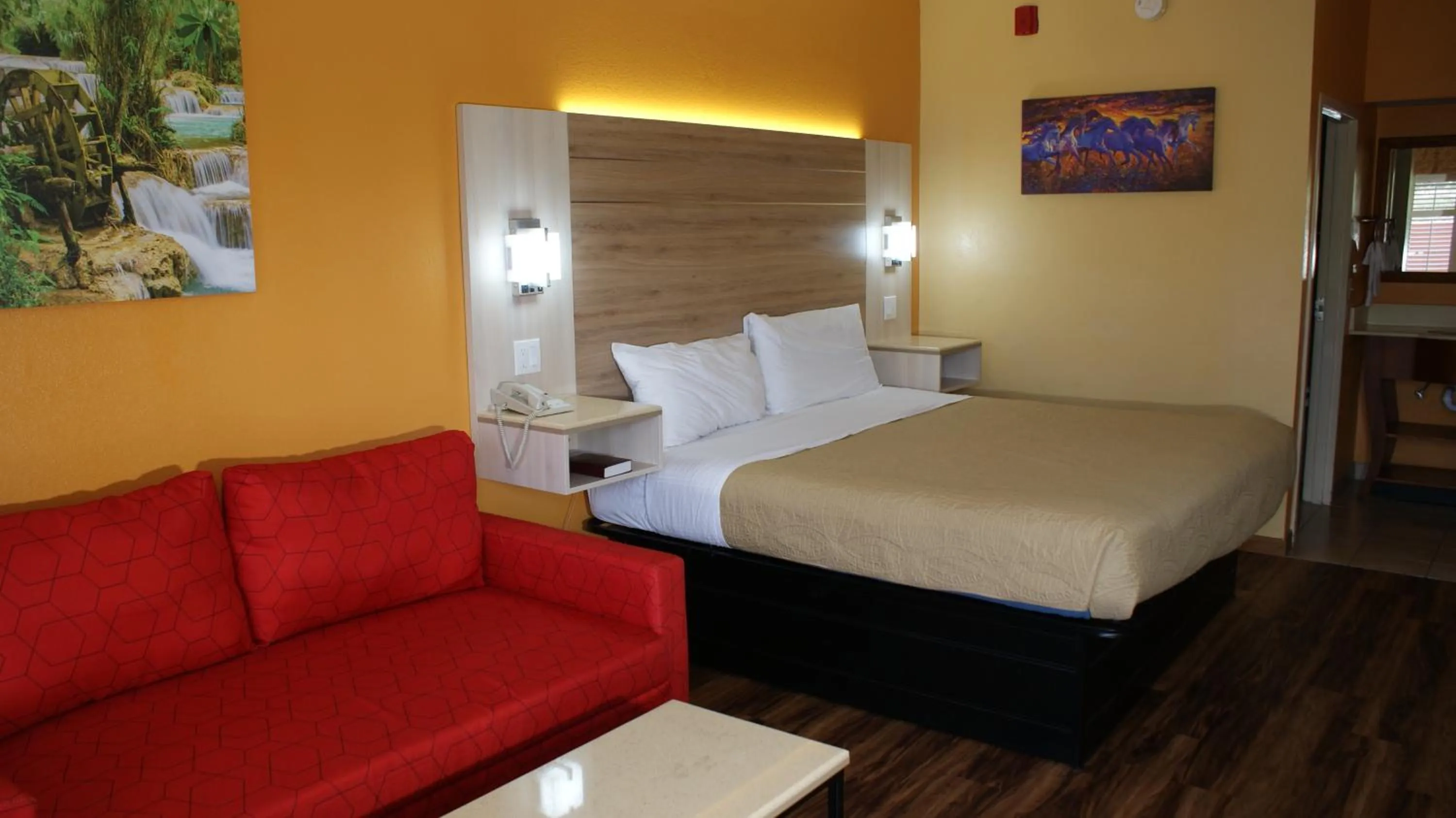 Bed in Home Town Inn & Suites