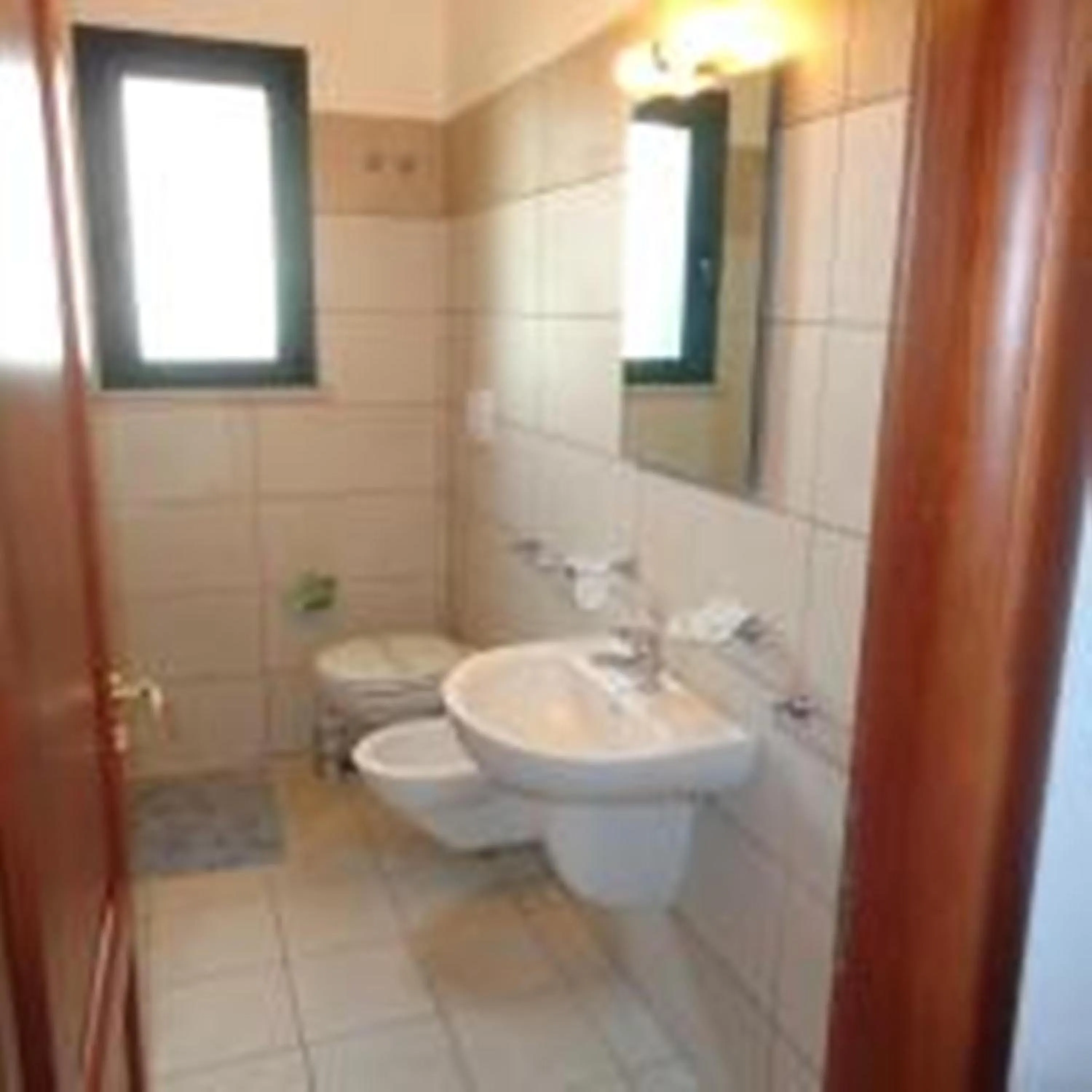 Bathroom in Residence - Blu Mare Alimini