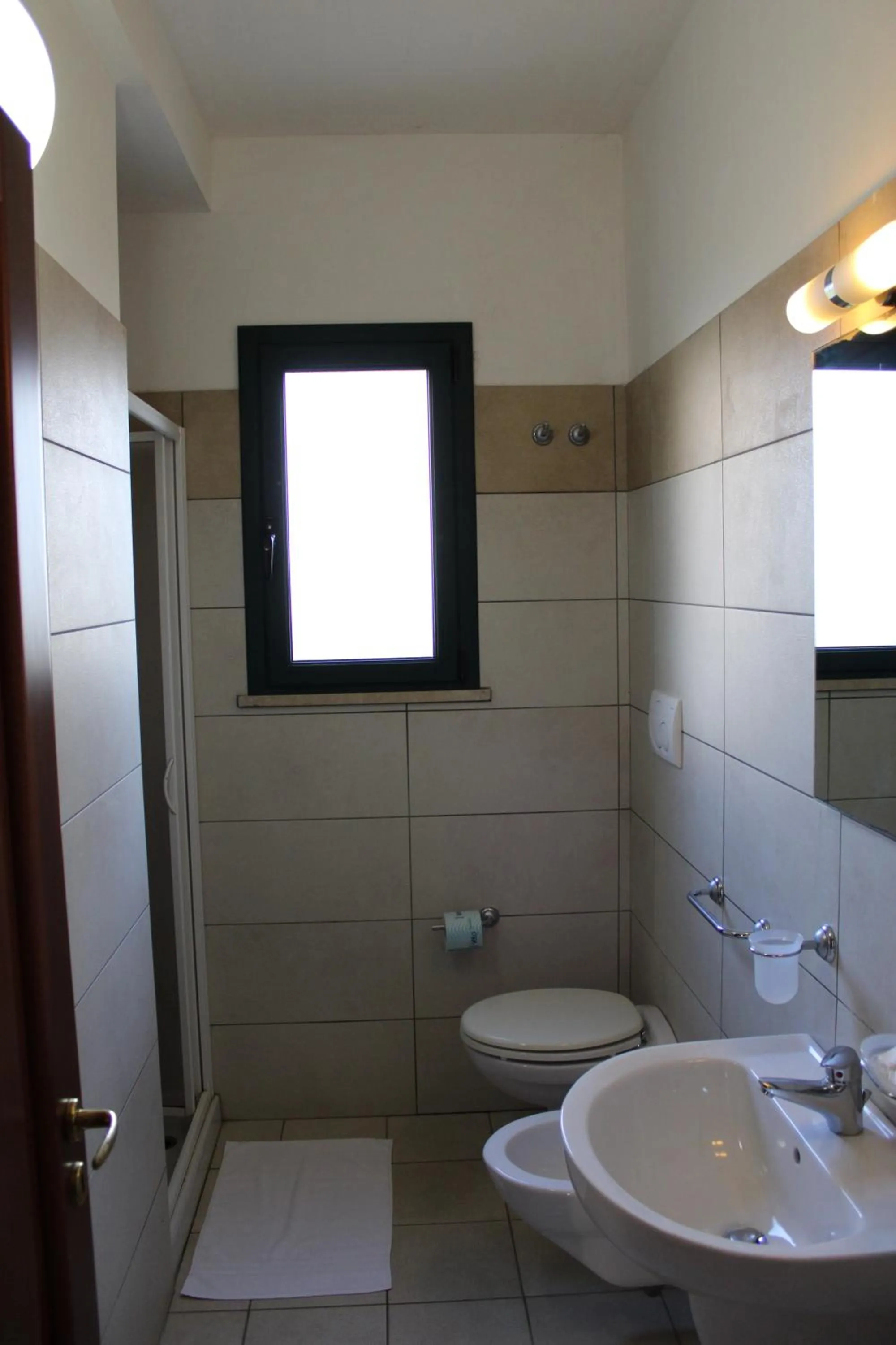 Bathroom in Residence - Blu Mare Alimini