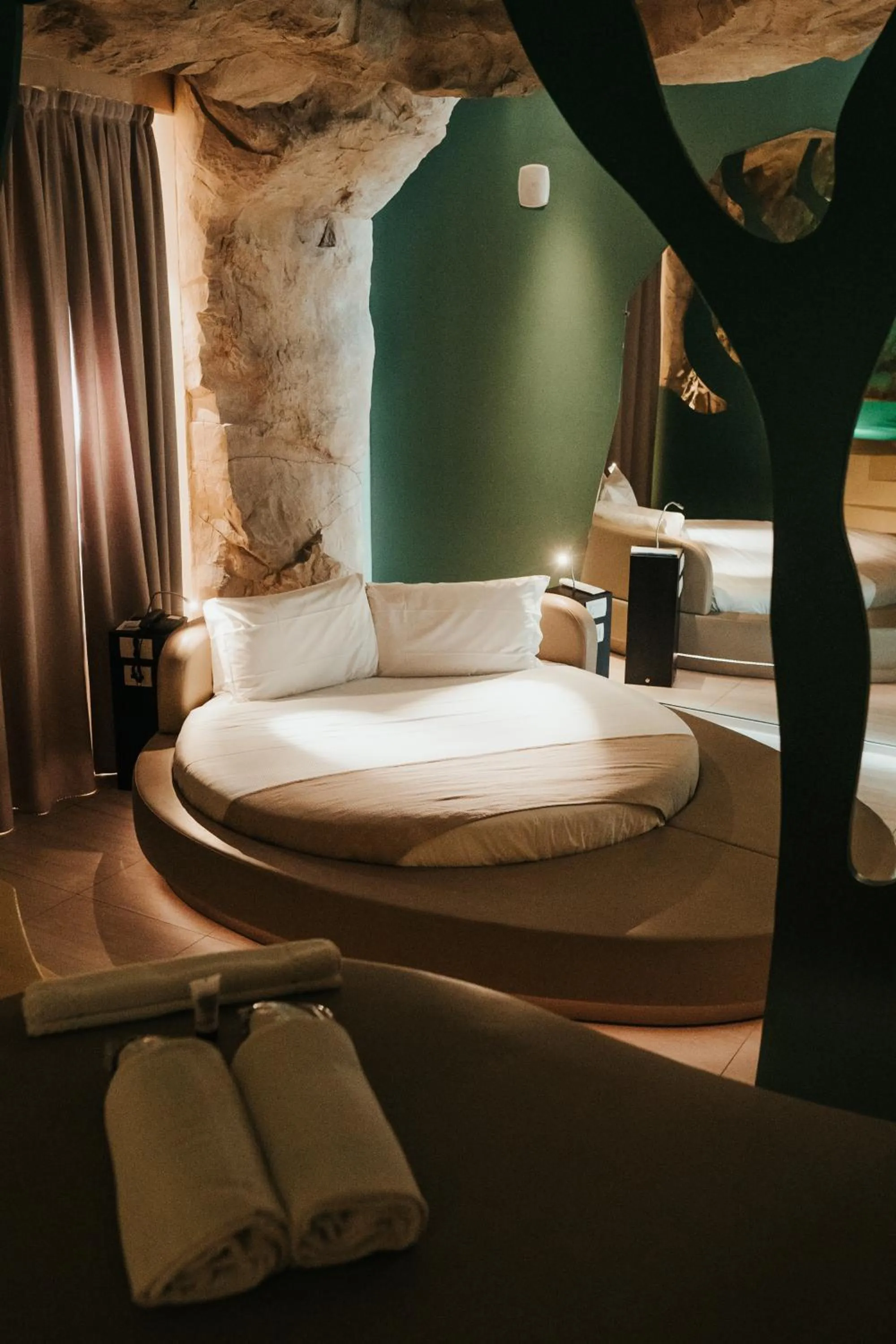 Bed in Emotional Grand Motel