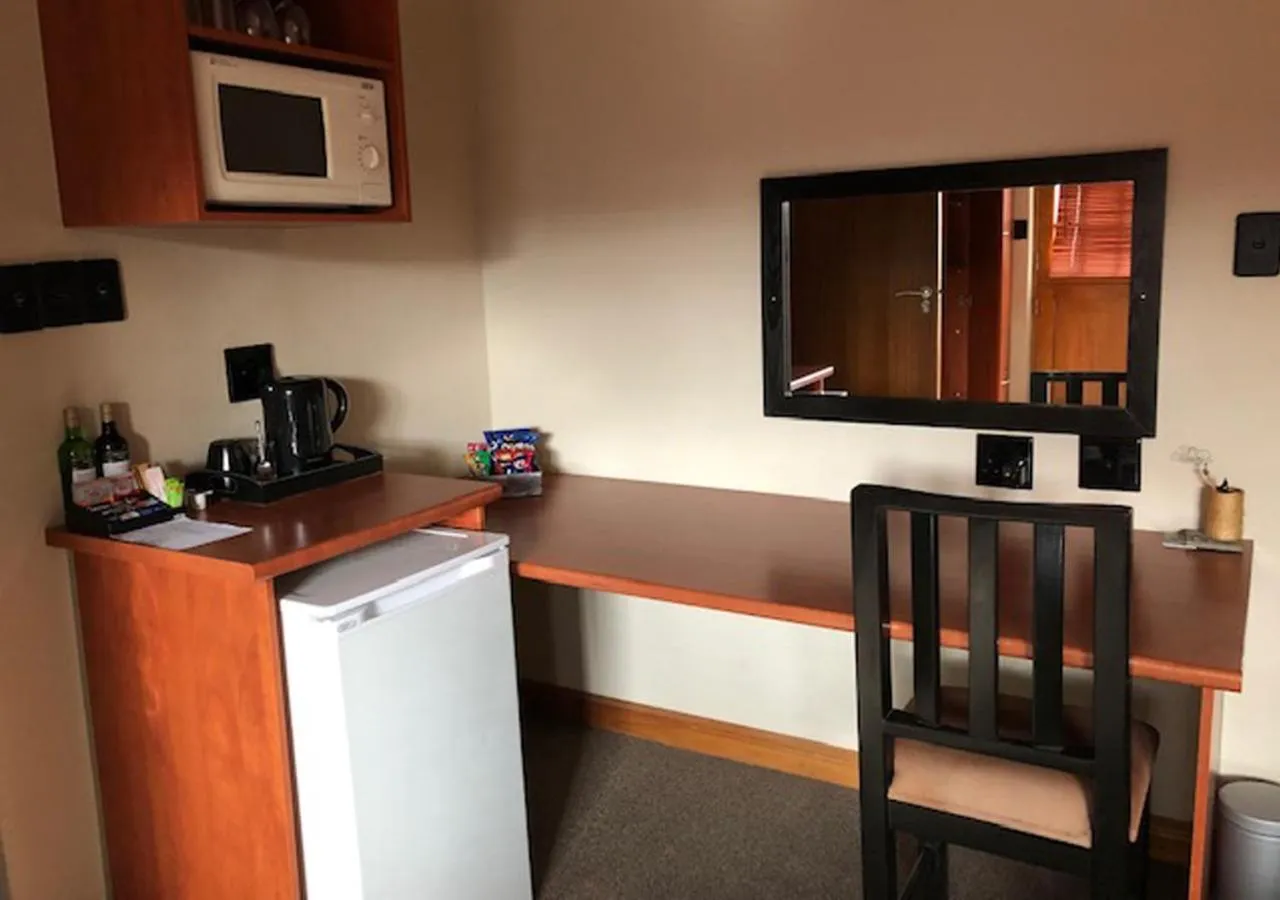 Bedroom in A La Martha's Air-Port Guest House