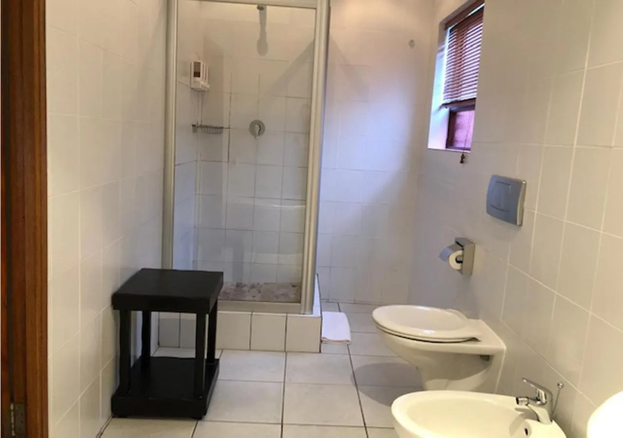 Bathroom in A La Martha's Air-Port Guest House