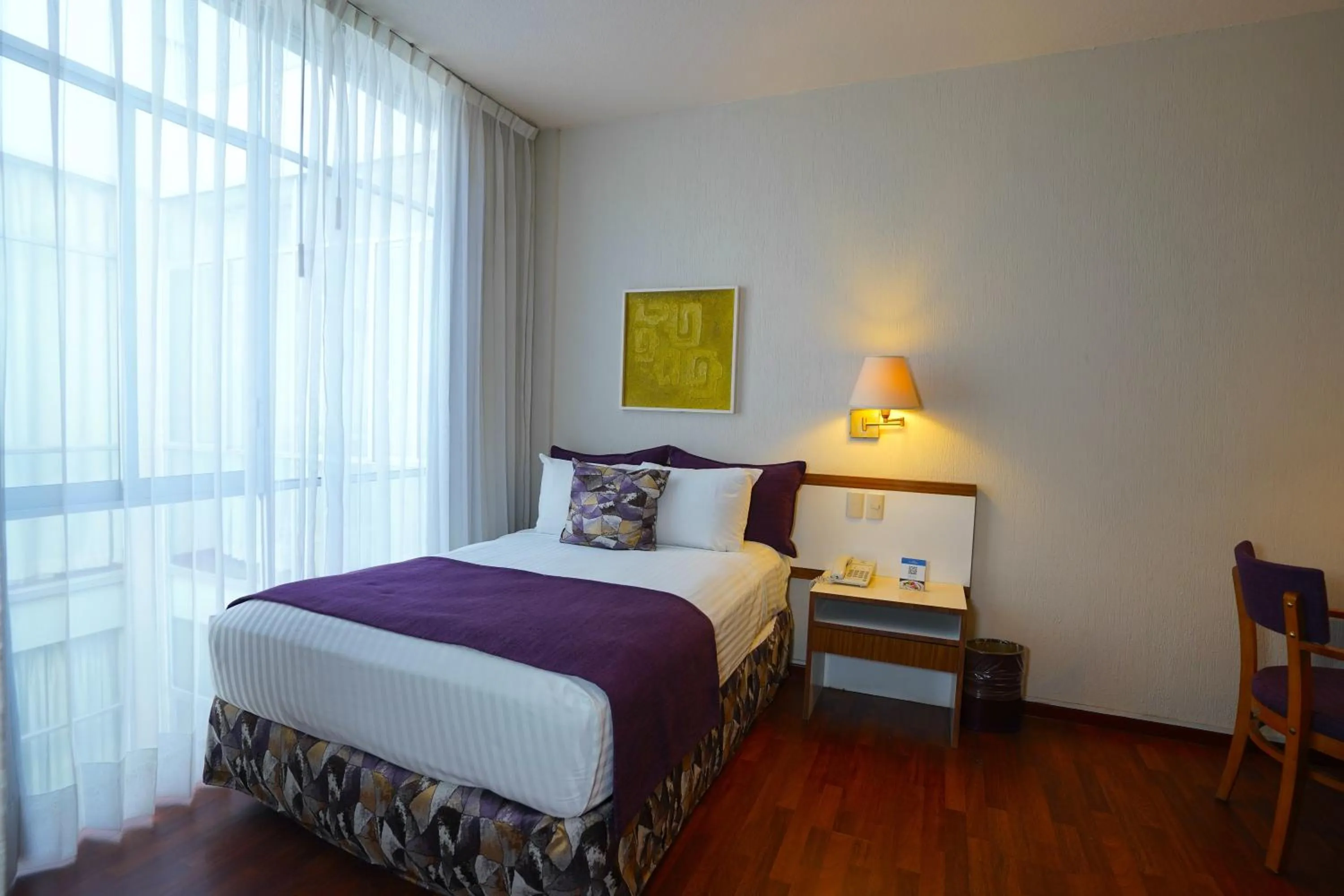 Decorative detail, Bed in Hotel San Marcos Express