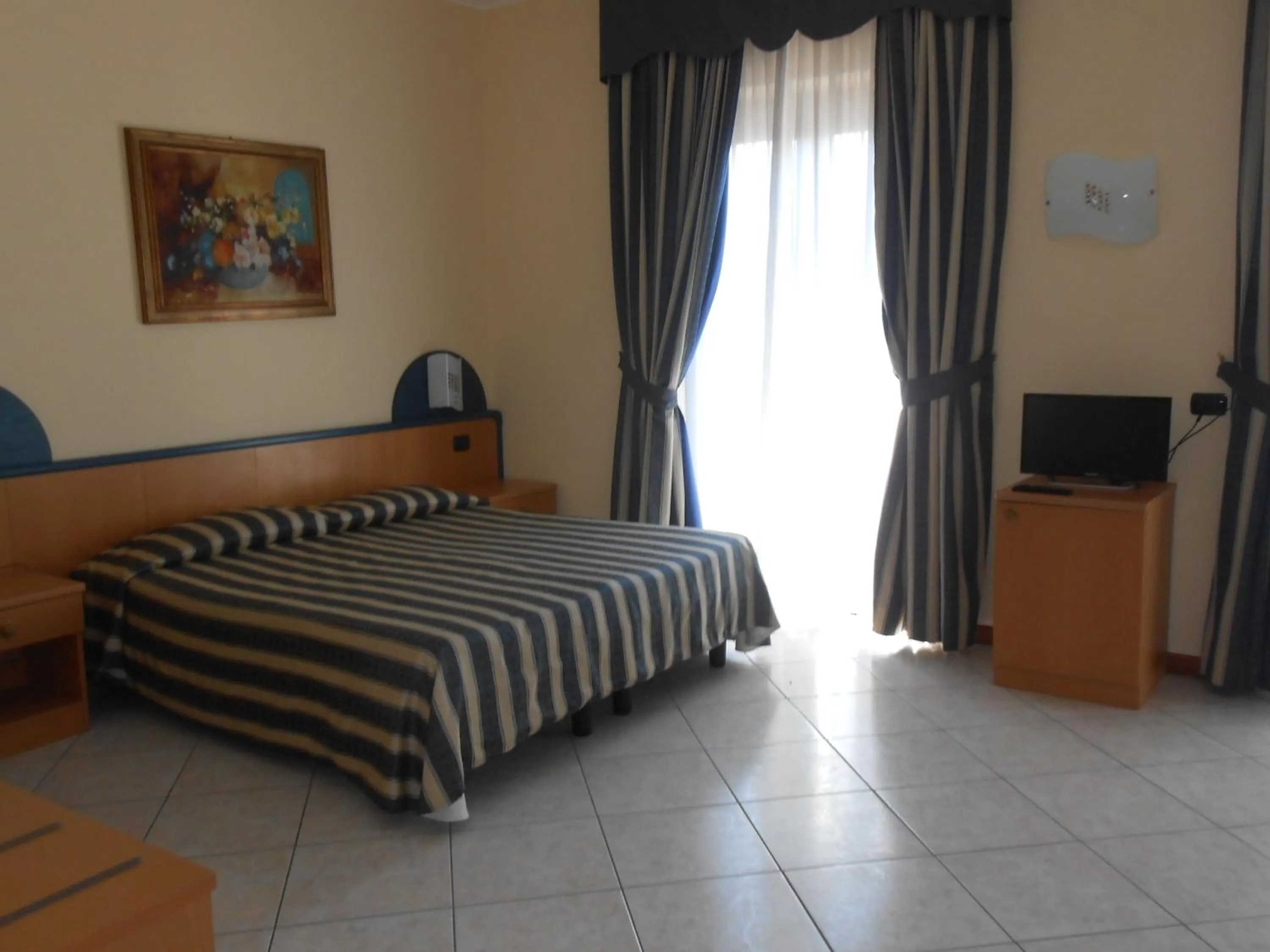 Photo of the whole room, Bed in Albergo Villa Eva