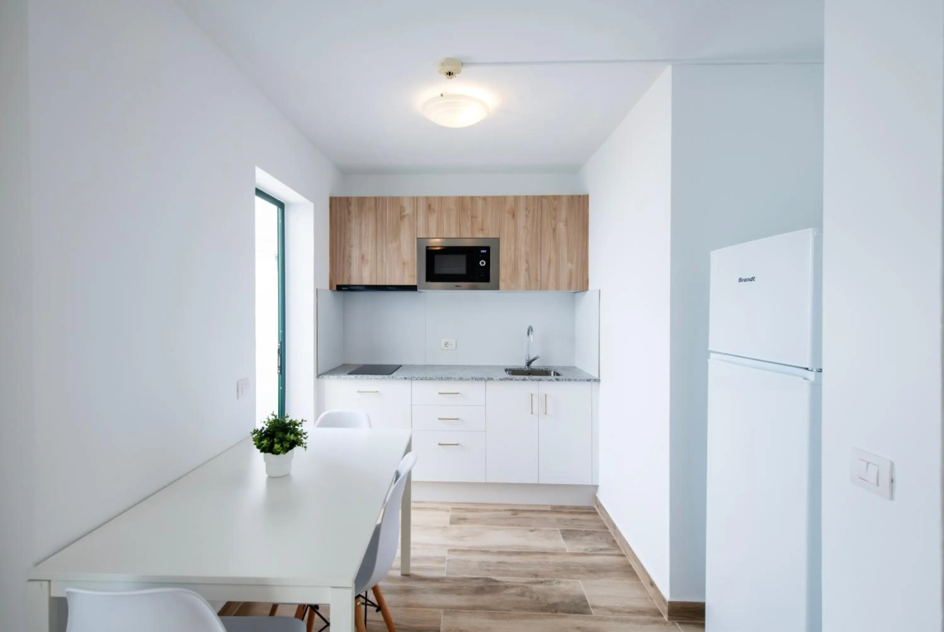 Kitchen or kitchenette in Apartamentos Los Rosales