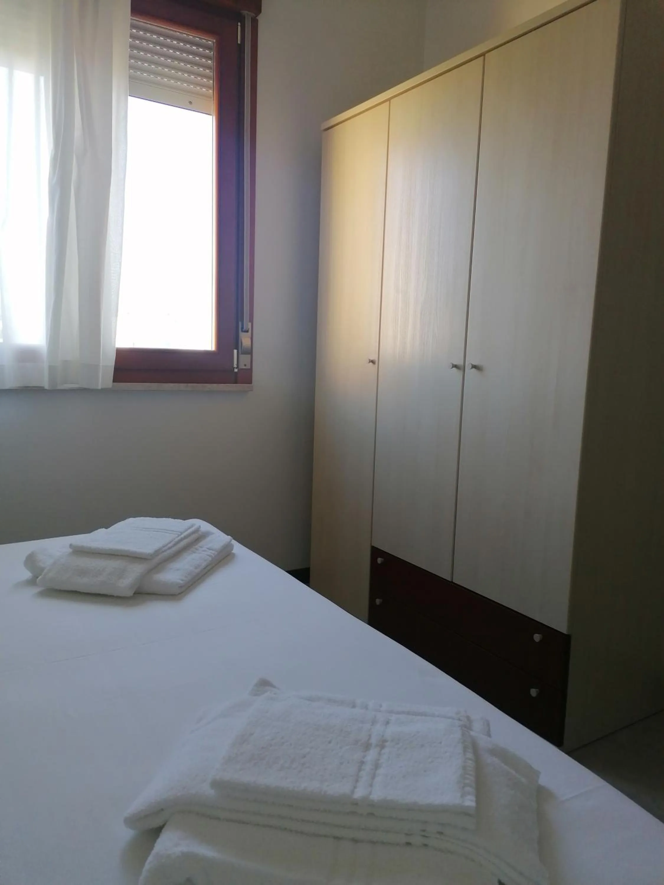 Bedroom, Bed in Aurora Residence