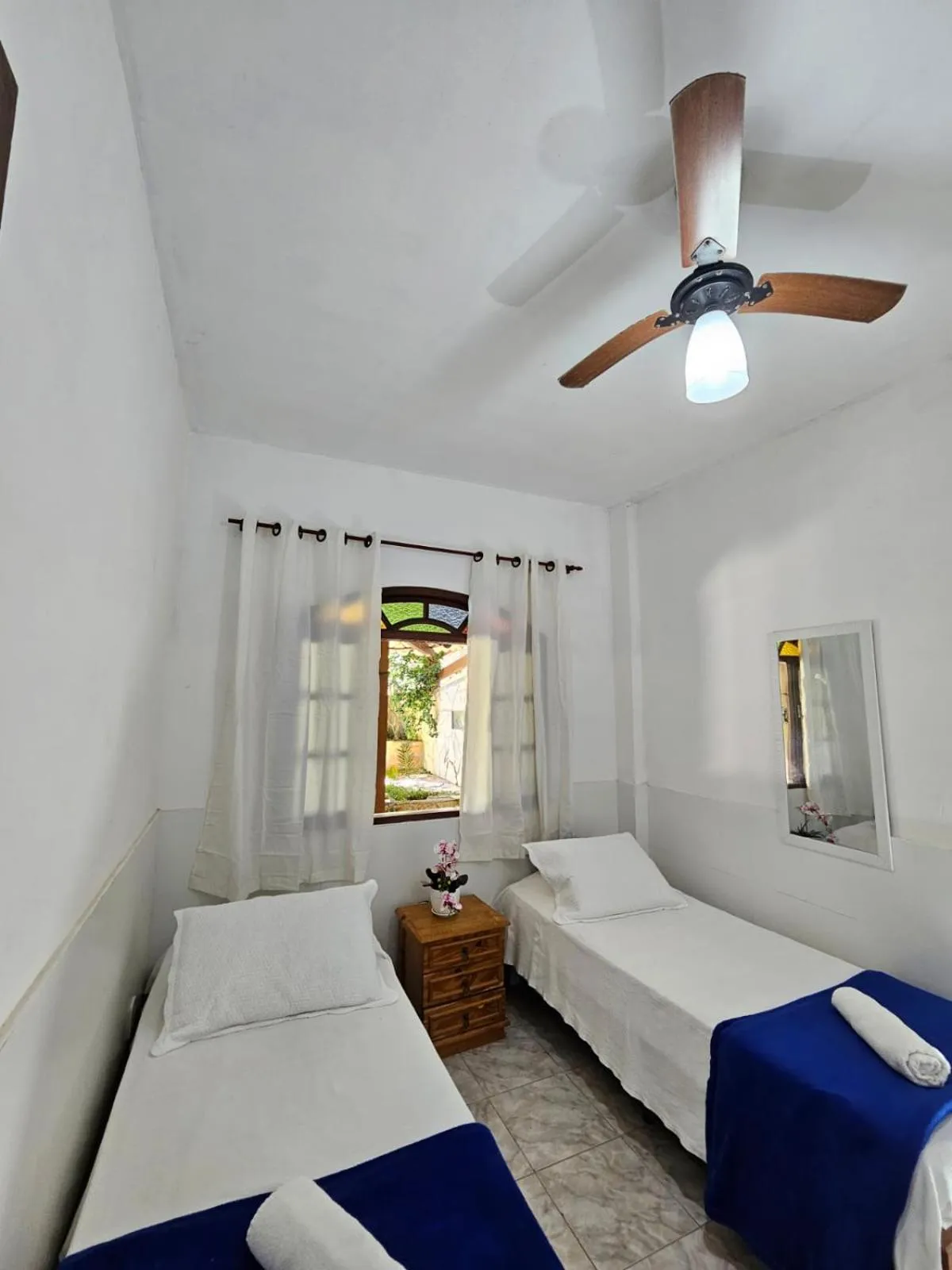 Bed in Pousada Recanto Das Emerências