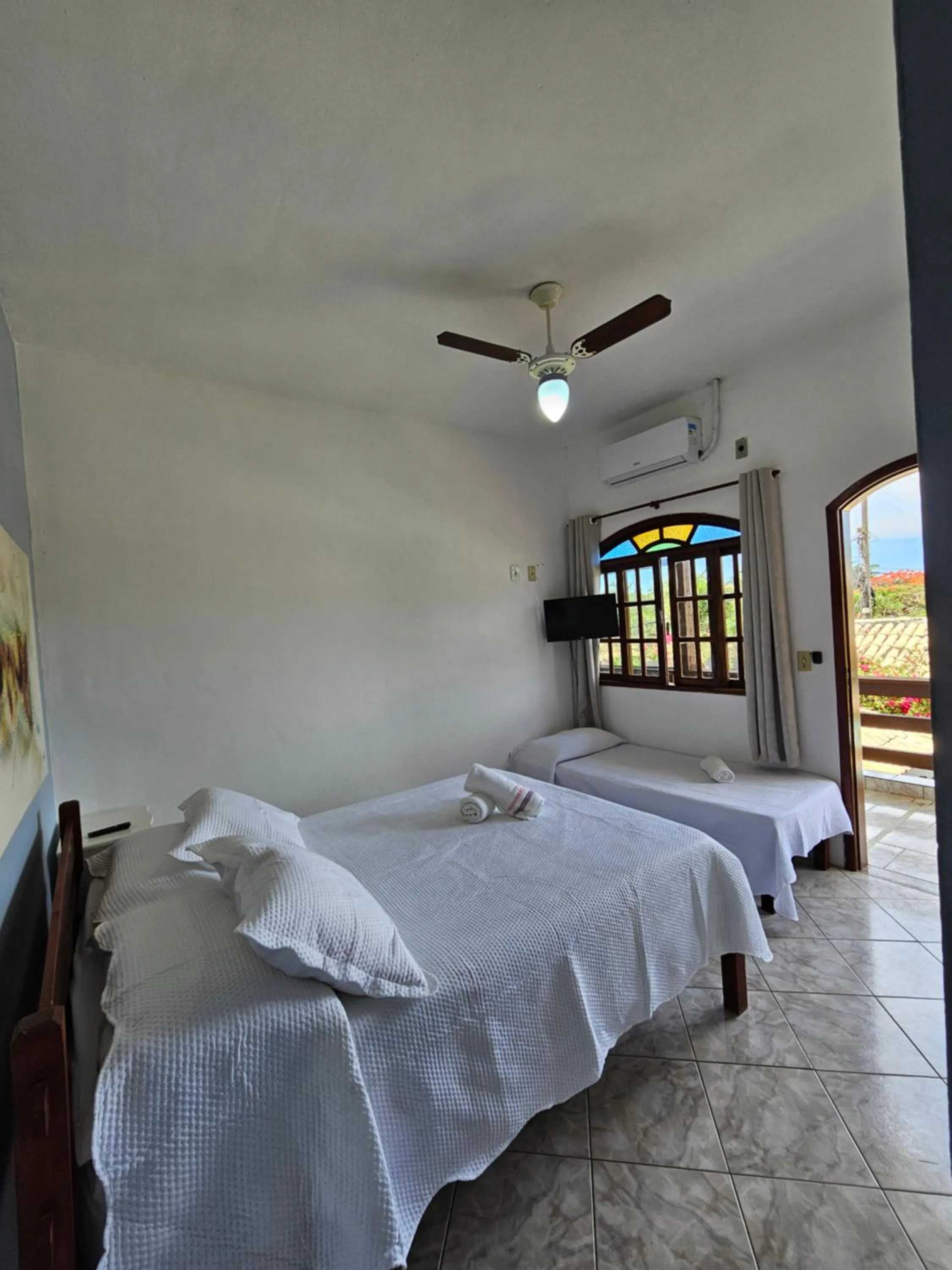 Bed in Pousada Recanto Das Emerências