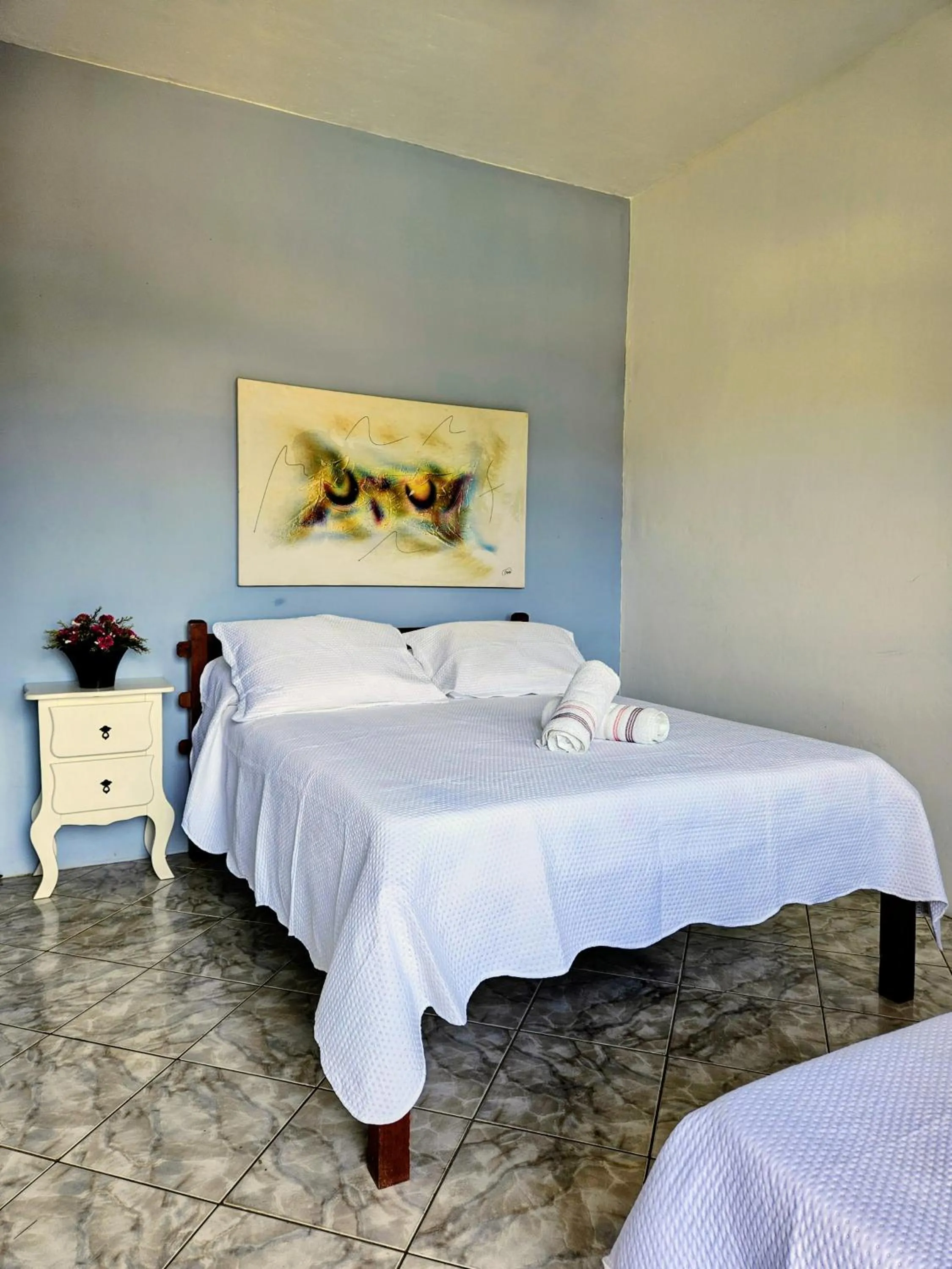 Bed in Pousada Recanto Das Emerências