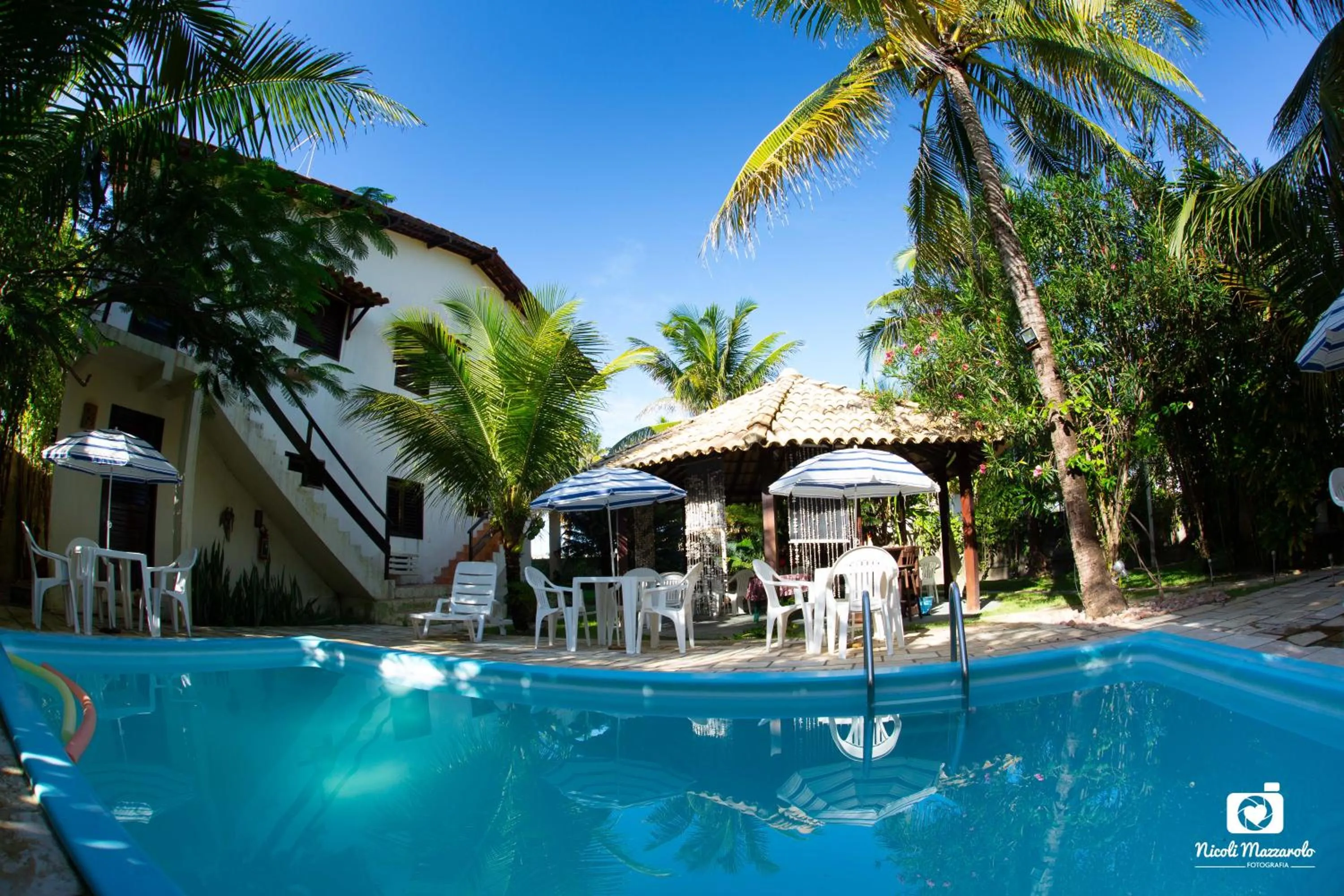 Swimming pool in Pousada Hibiscus