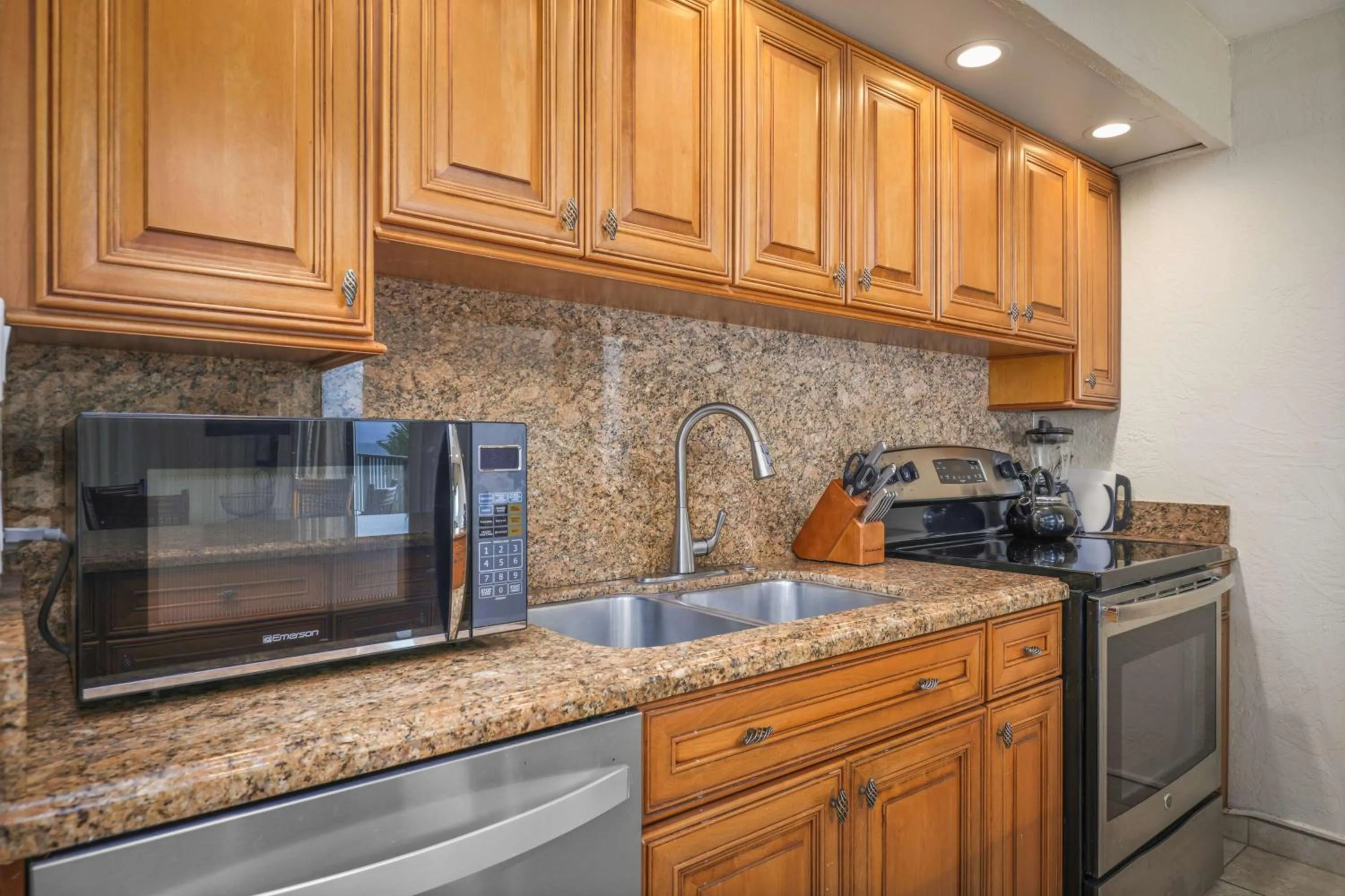 Kitchen or kitchenette in Aston at Papakea Resort