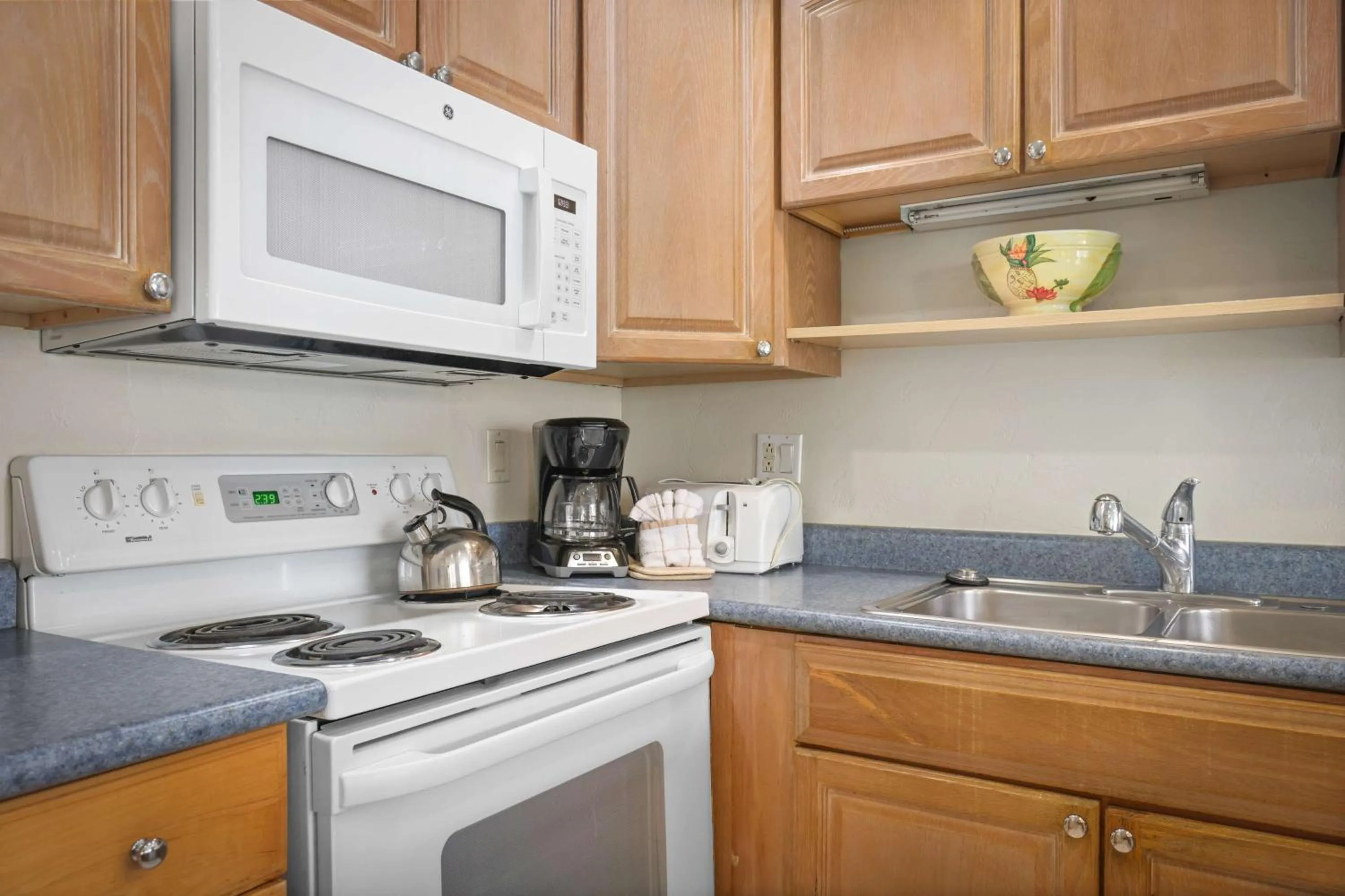 Kitchen or kitchenette in Aston at Papakea Resort