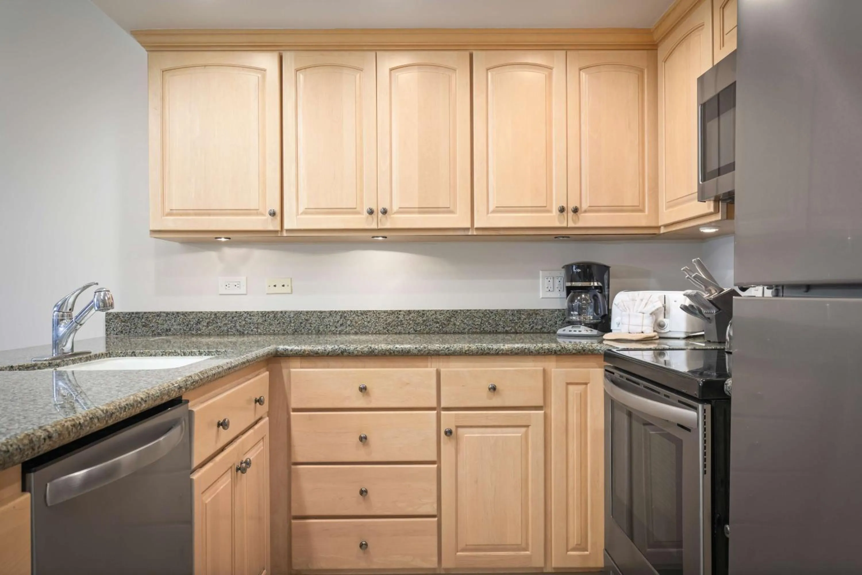 Kitchen or kitchenette in Aston at Papakea Resort