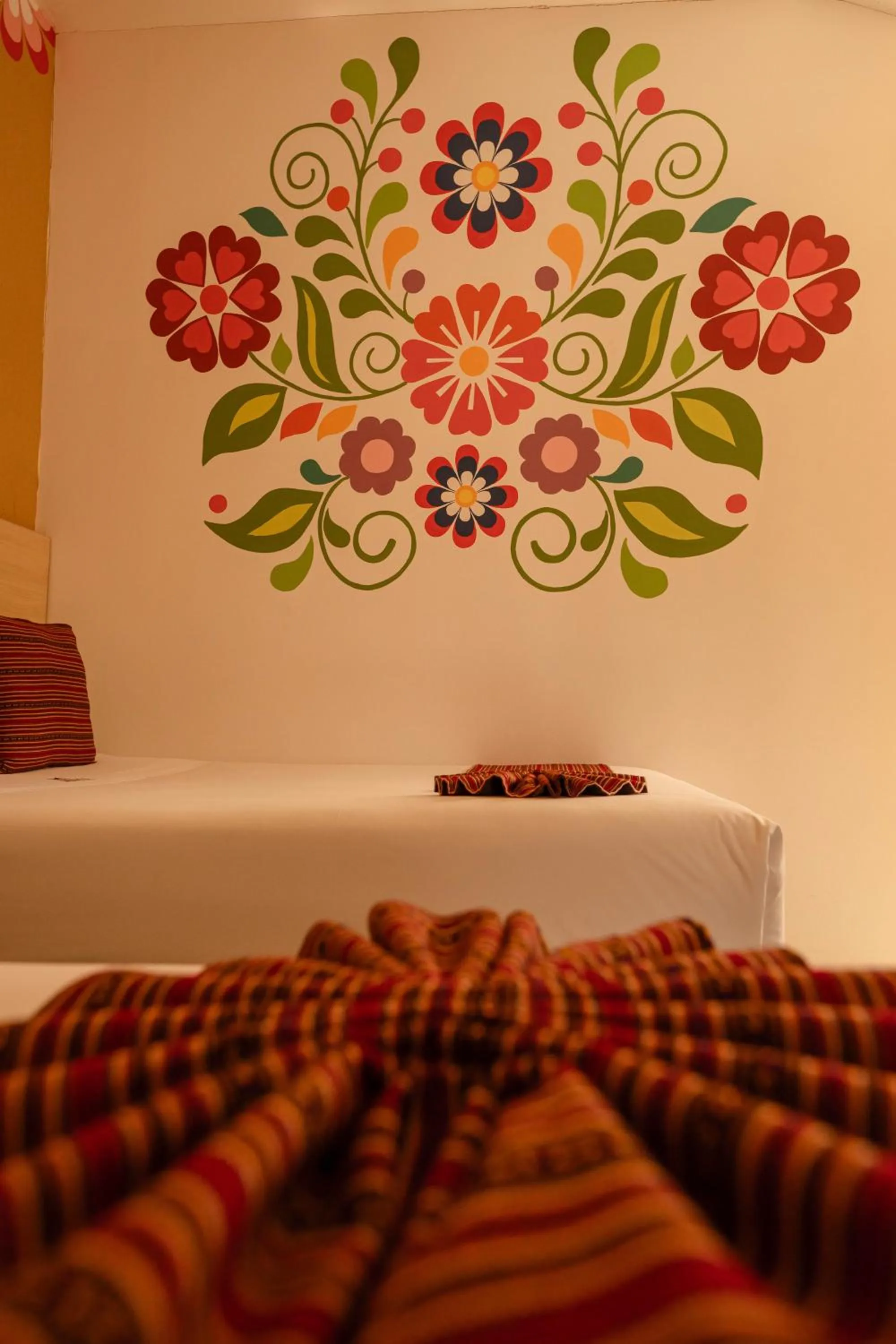 Bed in Mayu Boutique Hotel