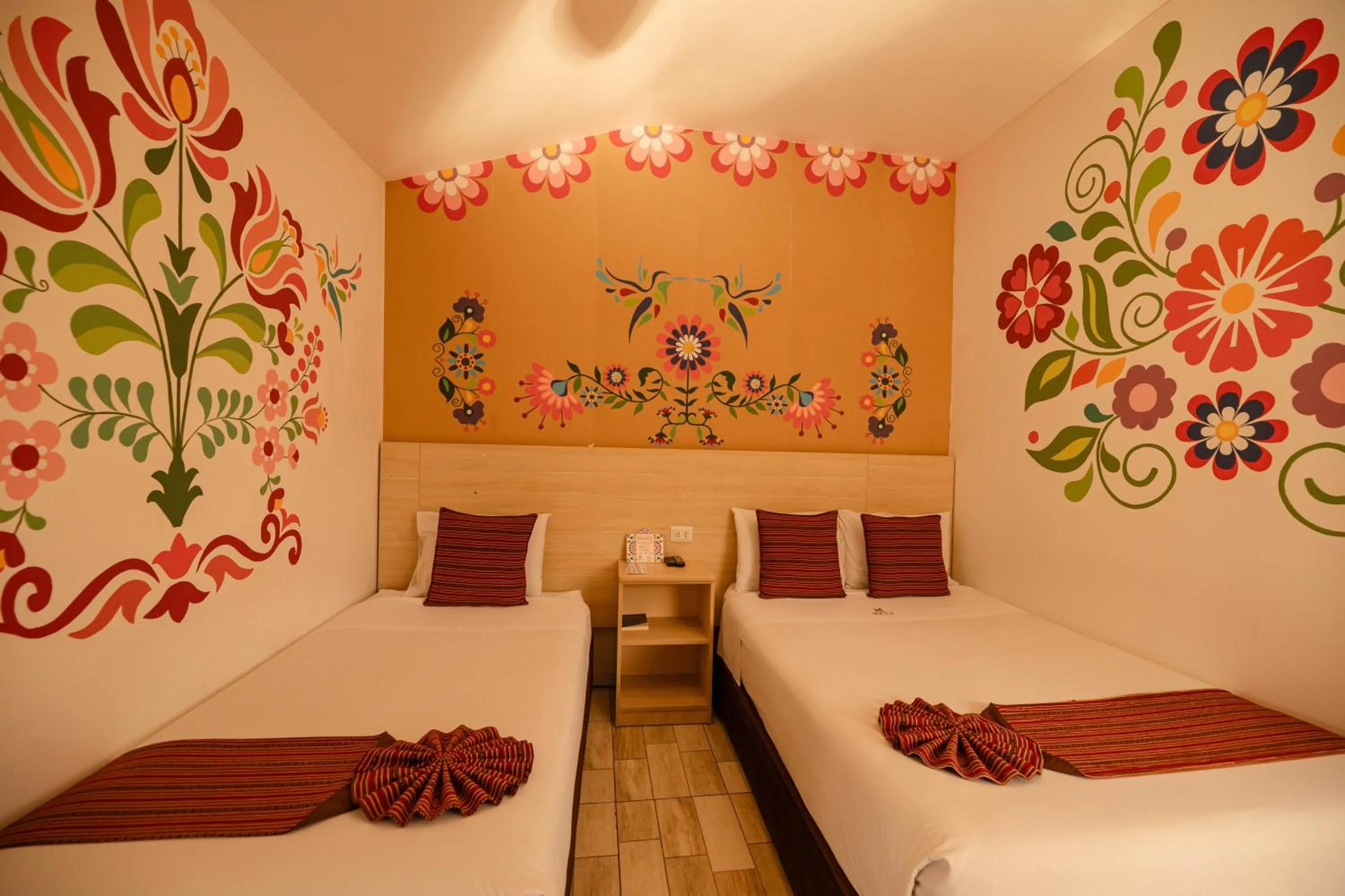 Bed in Mayu Boutique Hotel