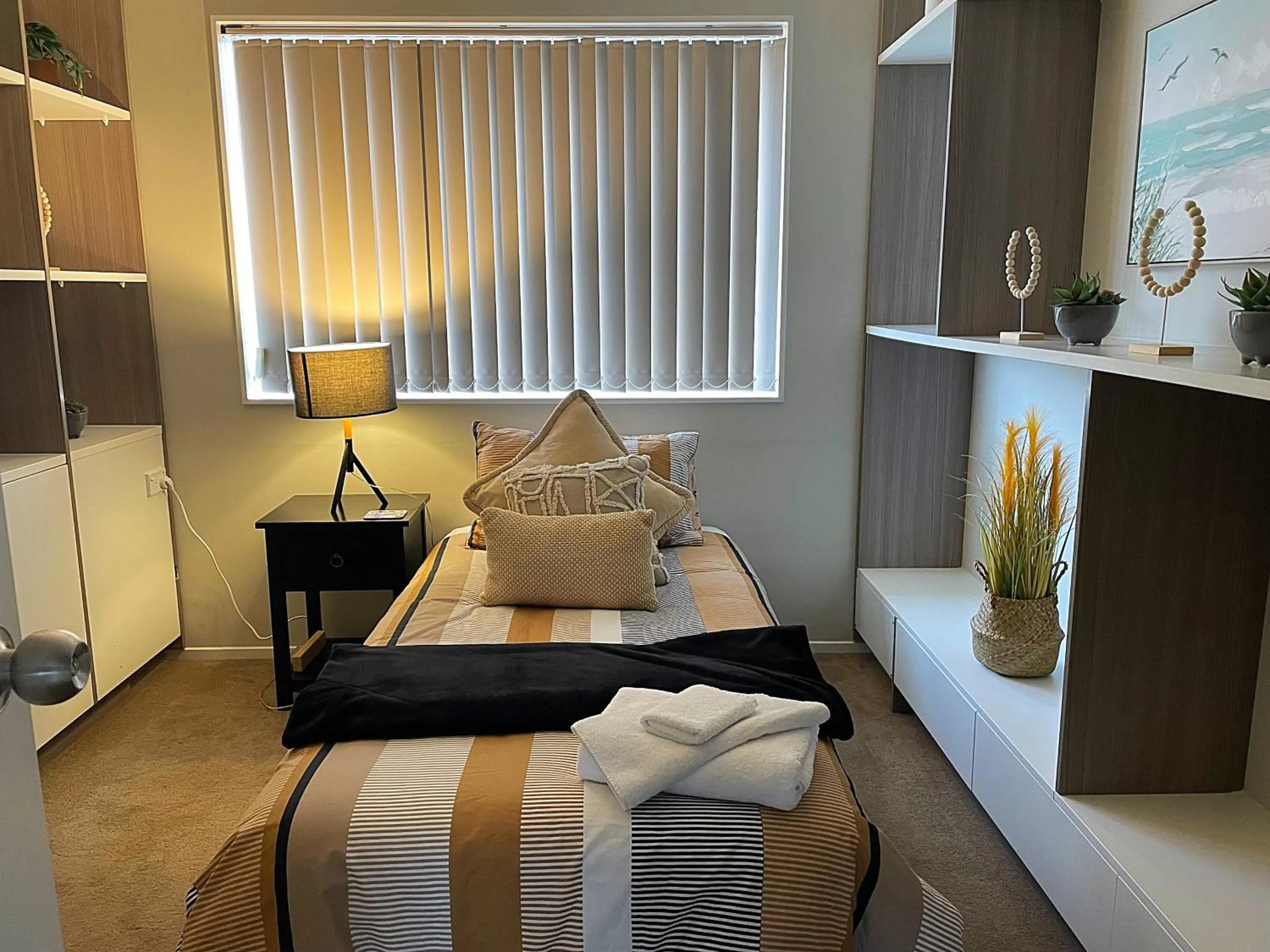 Bed in Flat Bush Holiday Accommodation