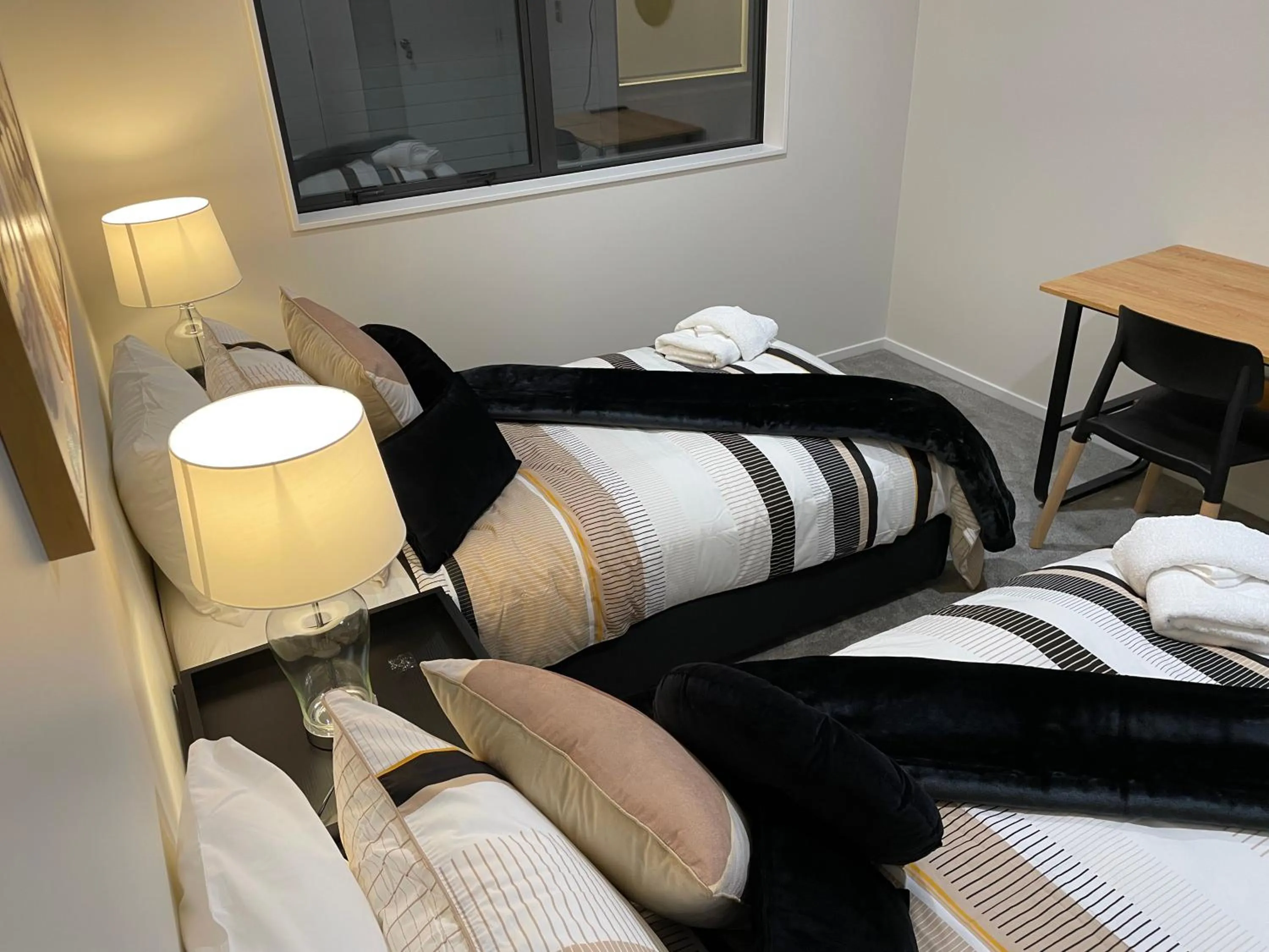 Bed in Flat Bush Holiday Accommodation