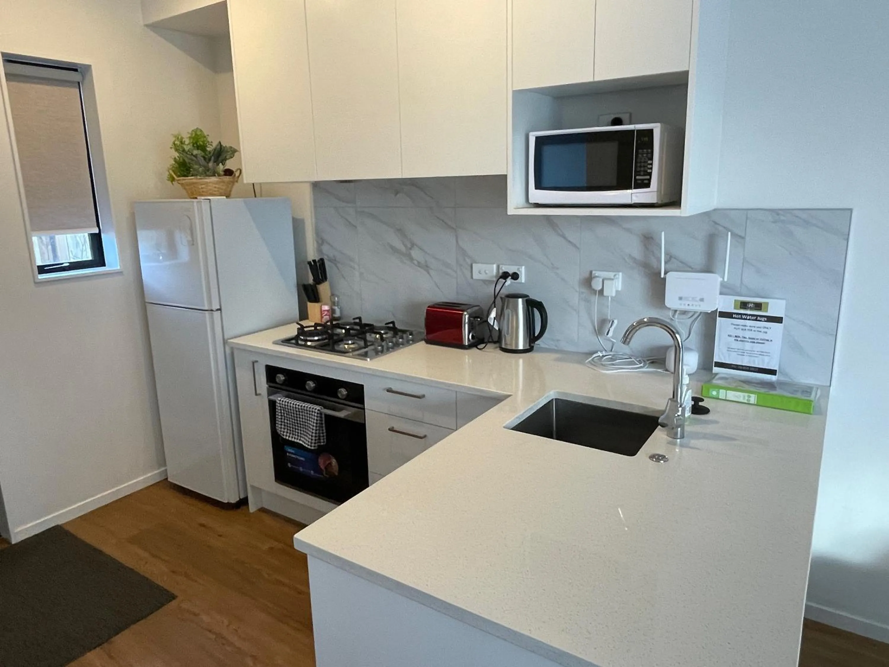 dishwasher in Flat Bush Holiday Accommodation