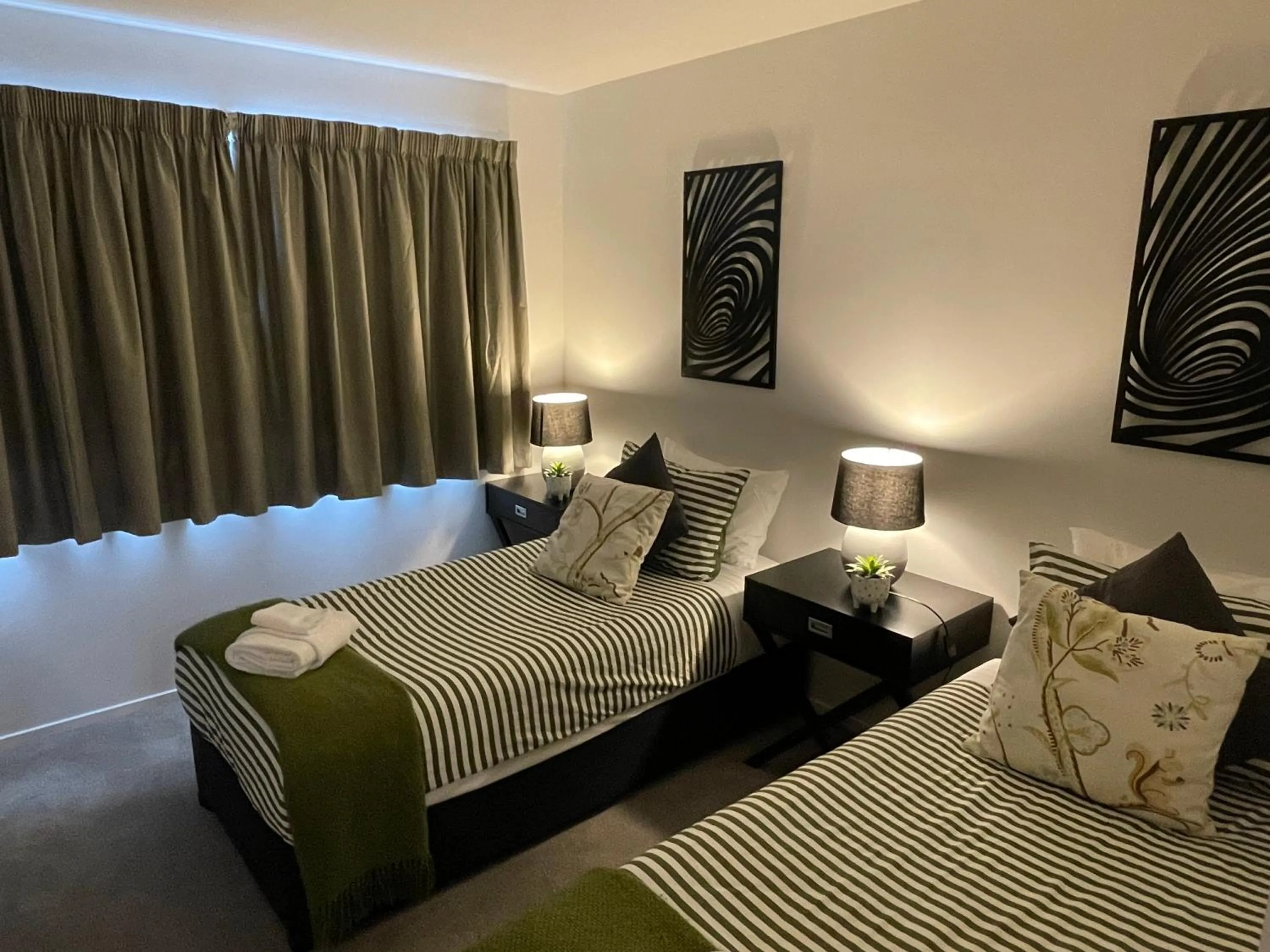 Bed in Flat Bush Holiday Accommodation