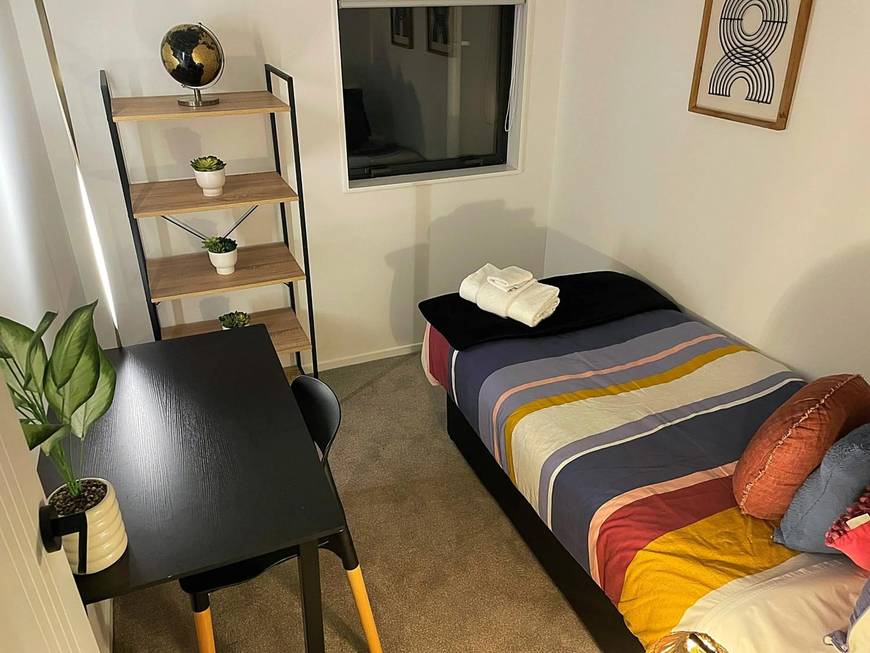 Bed in Flat Bush Holiday Accommodation