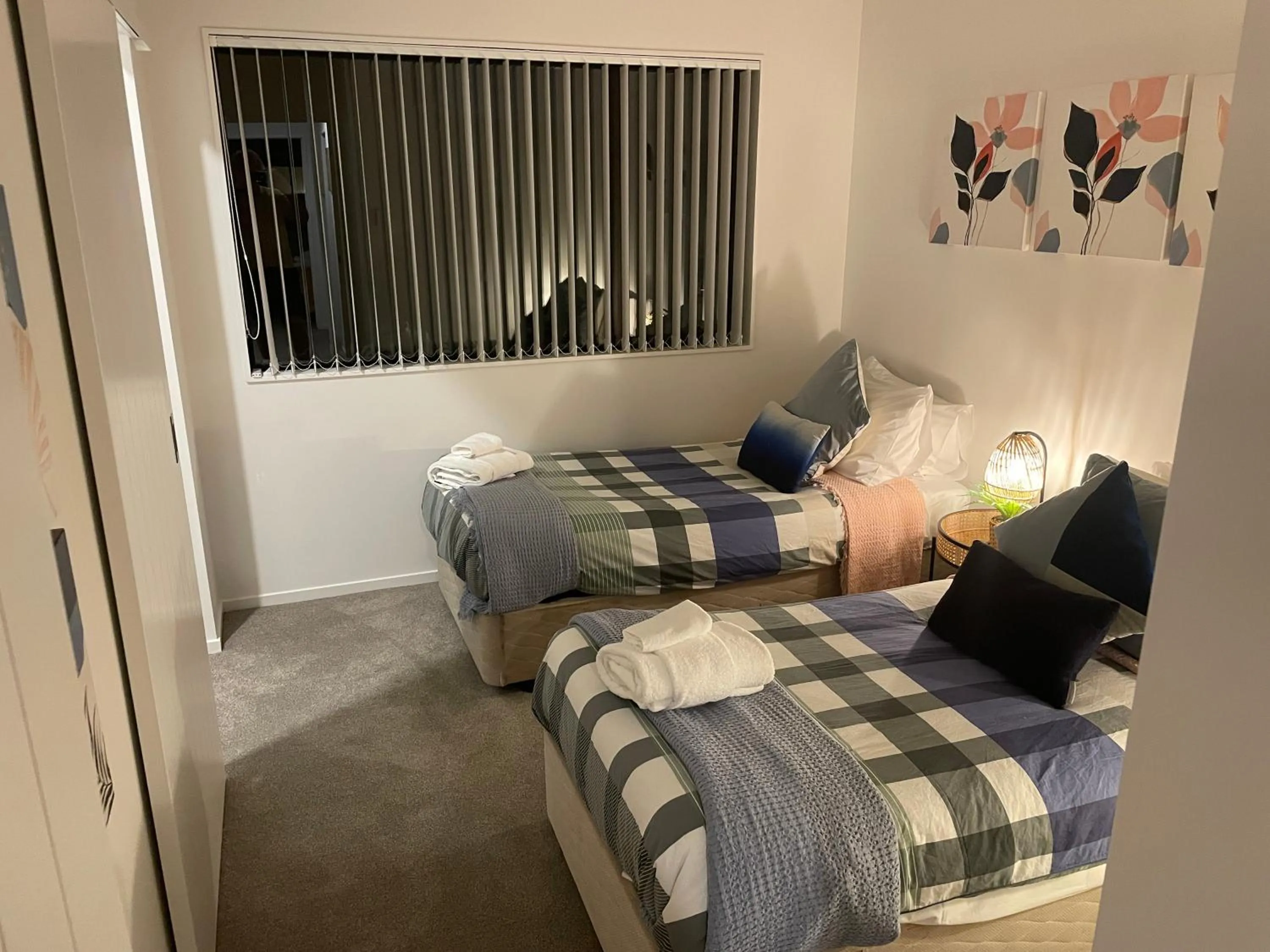 Bed in Flat Bush Holiday Accommodation