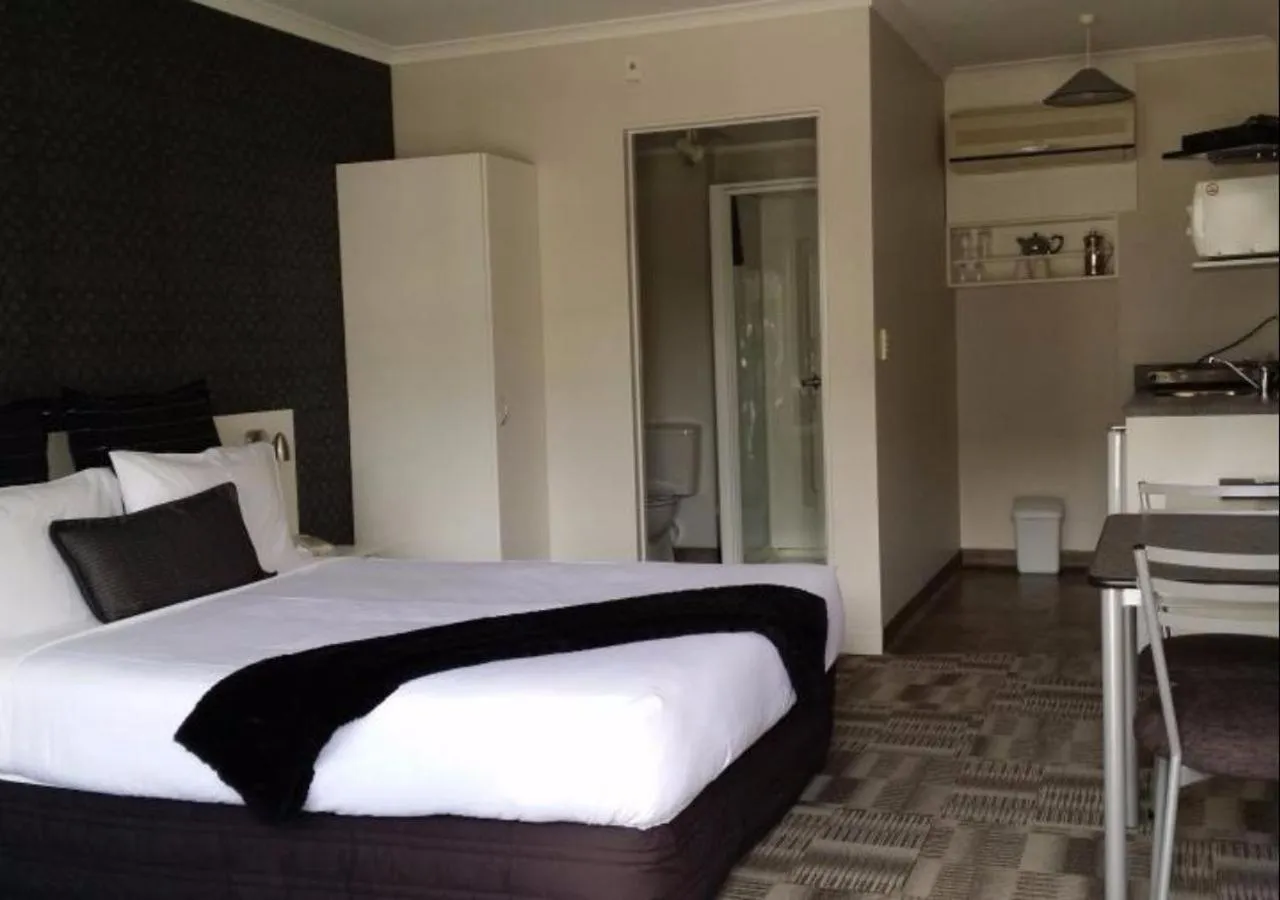 Bed in ASURE Abode On Courtenay Motor Inn