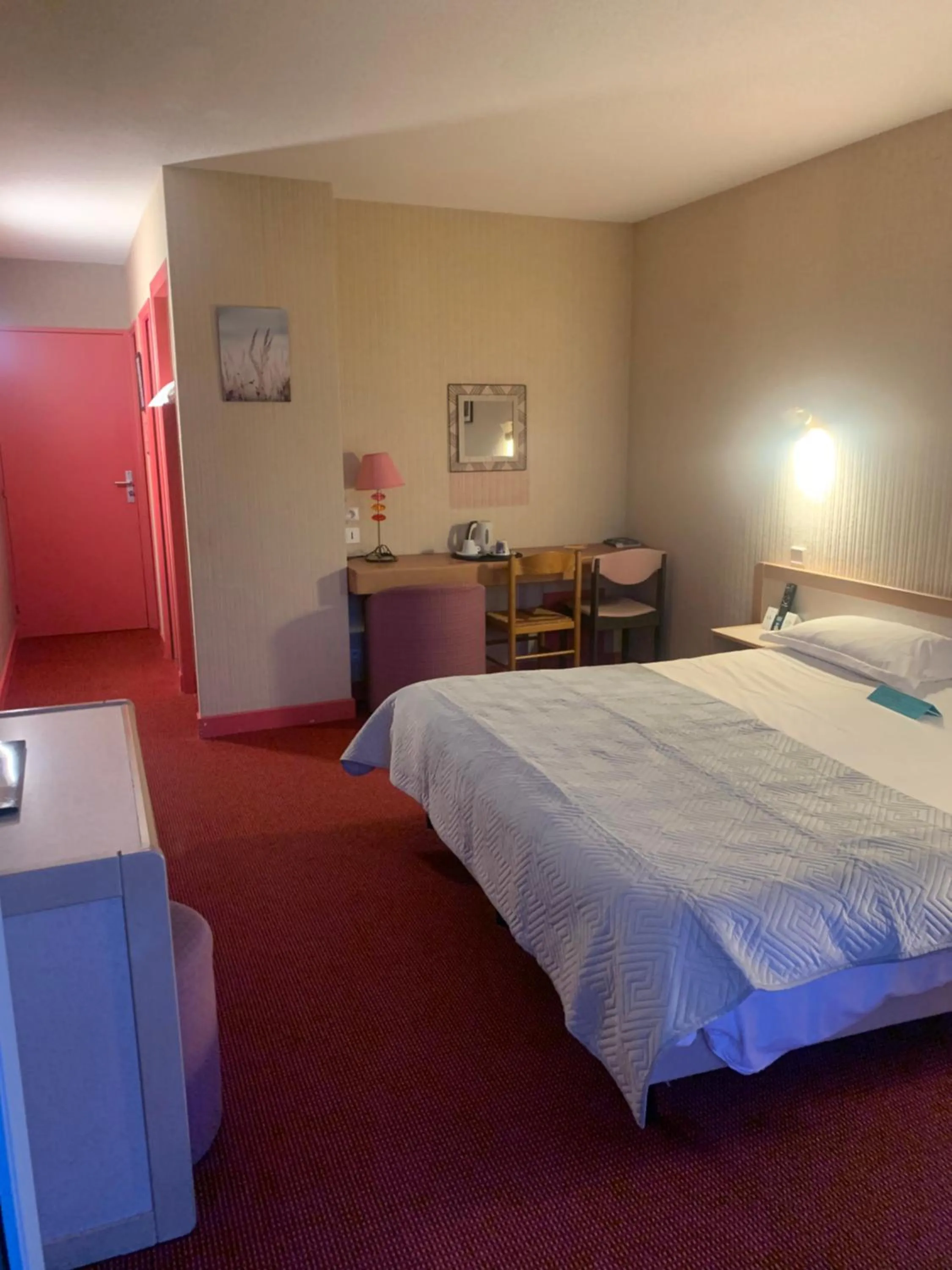 Bed in Hôtel du Lac