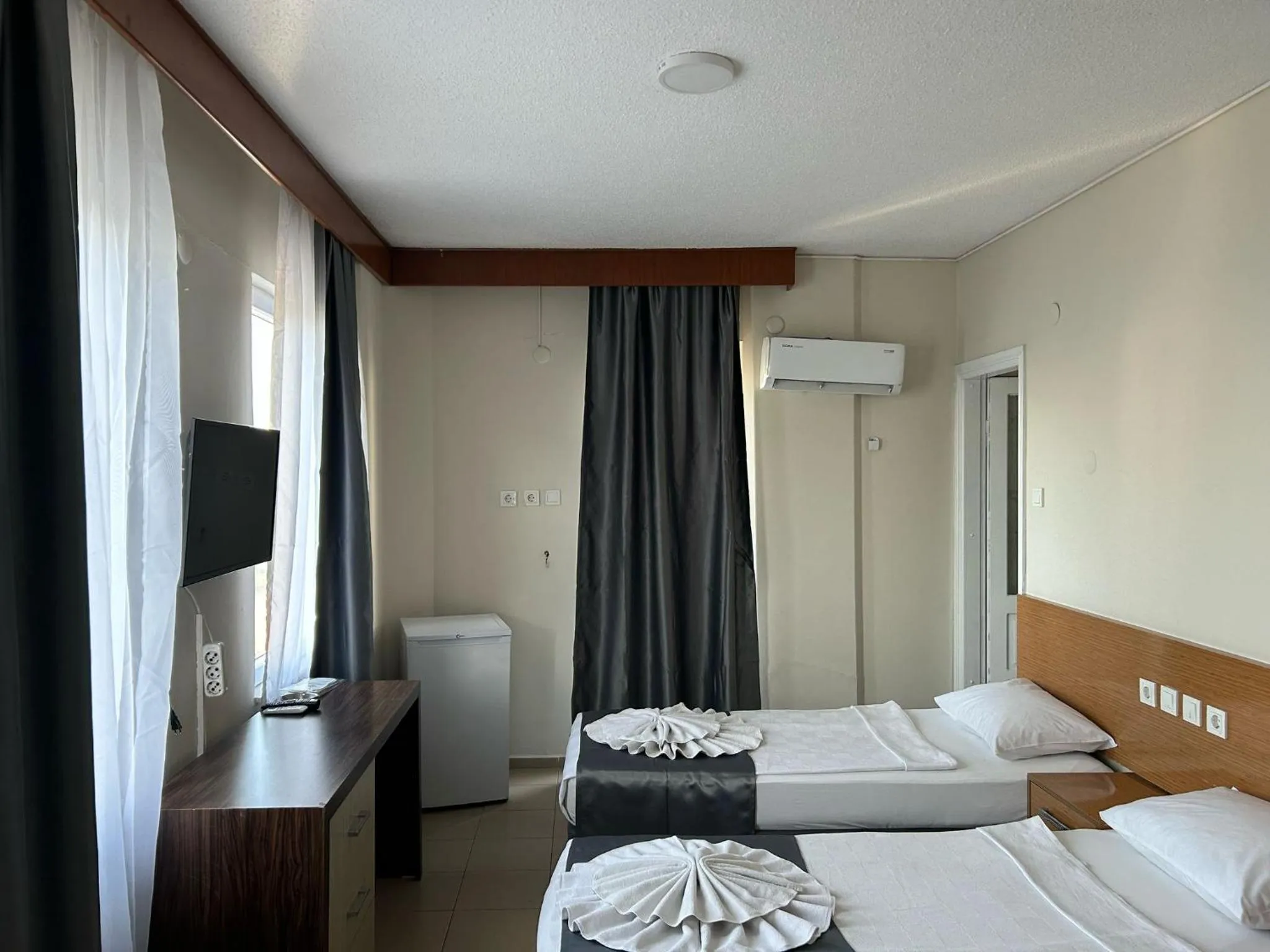 Bed in Rosella Hotel