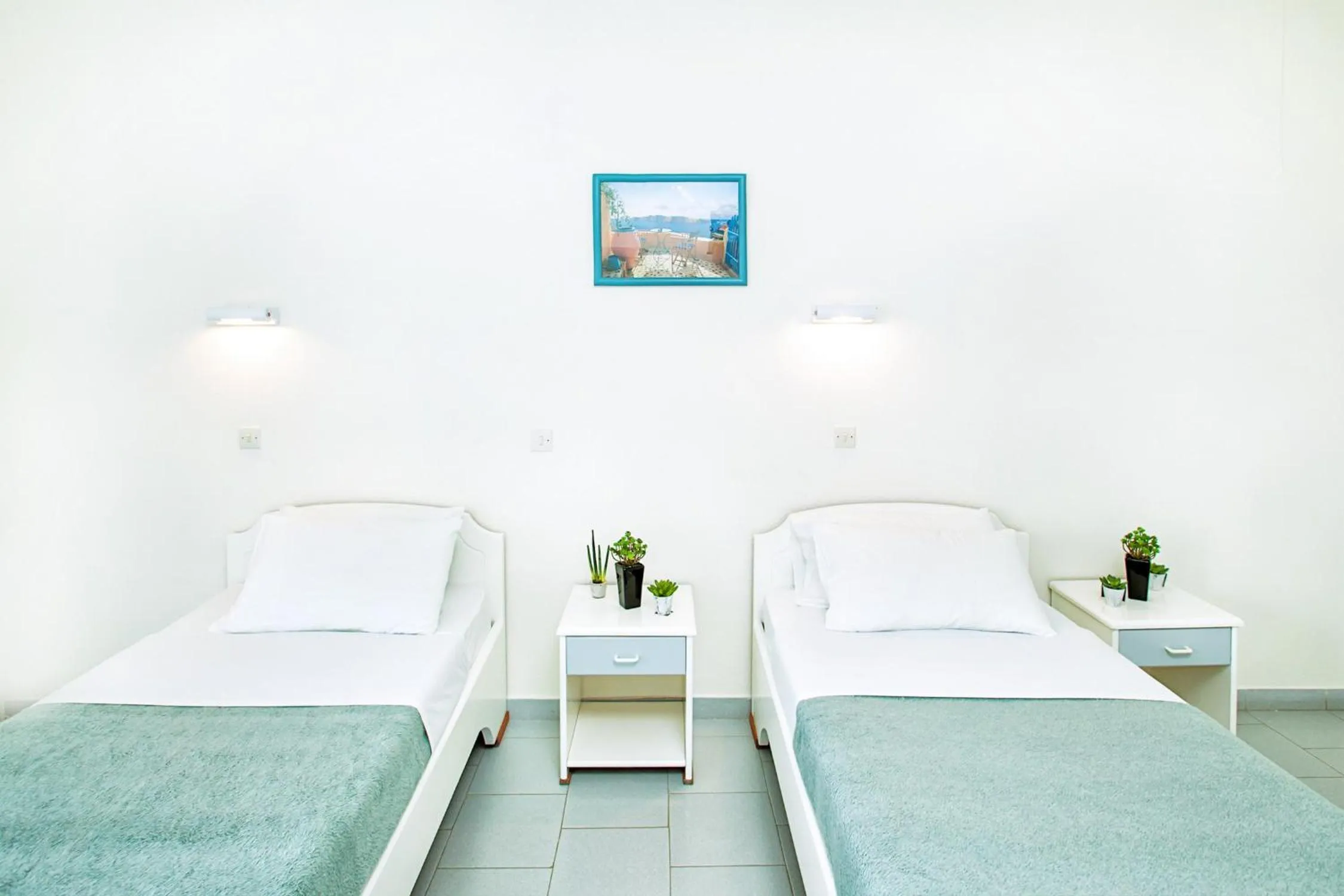 Bed in Xenios Port Marina Hotel