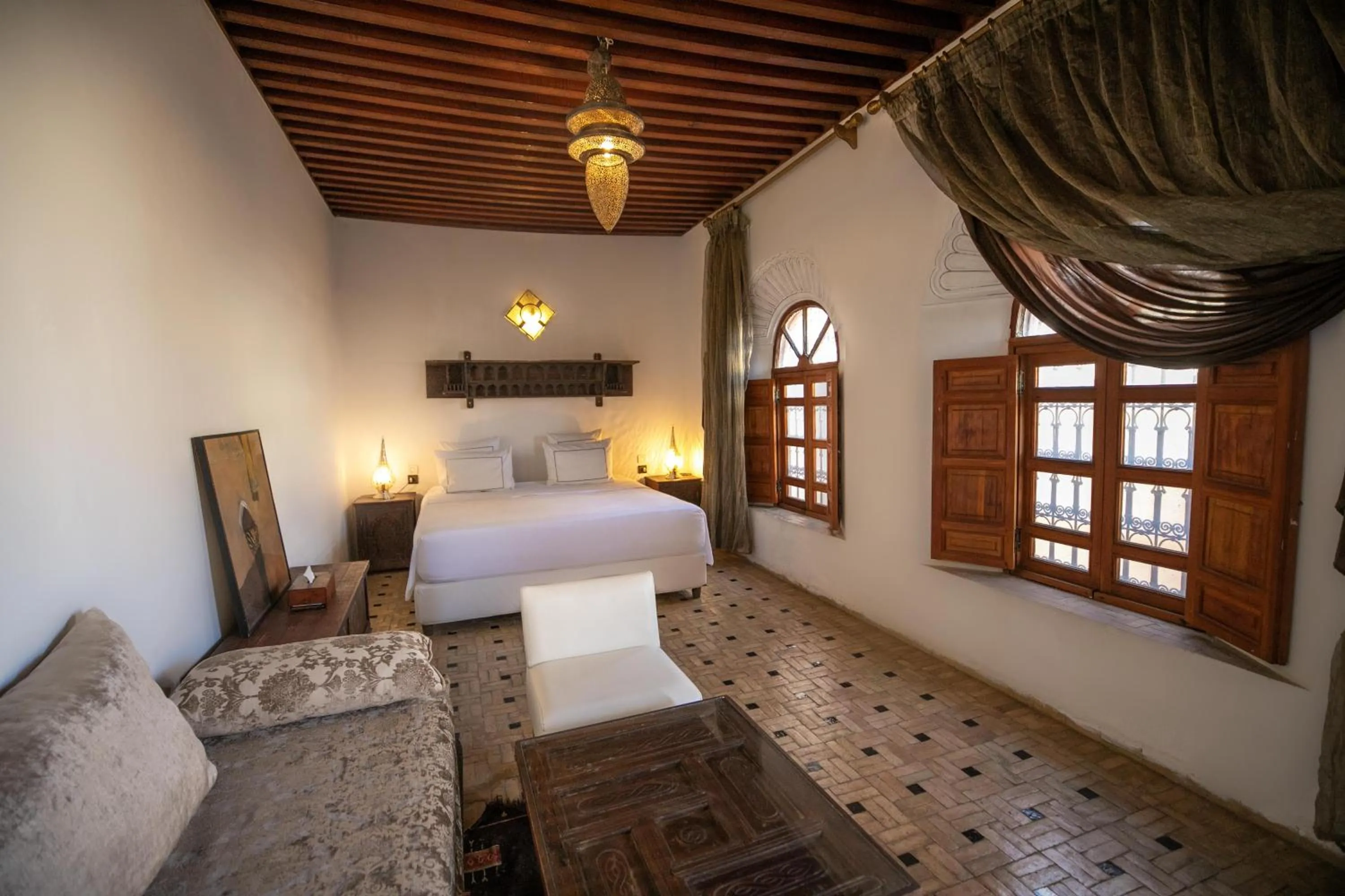 Living room, Bed in Riad Layla