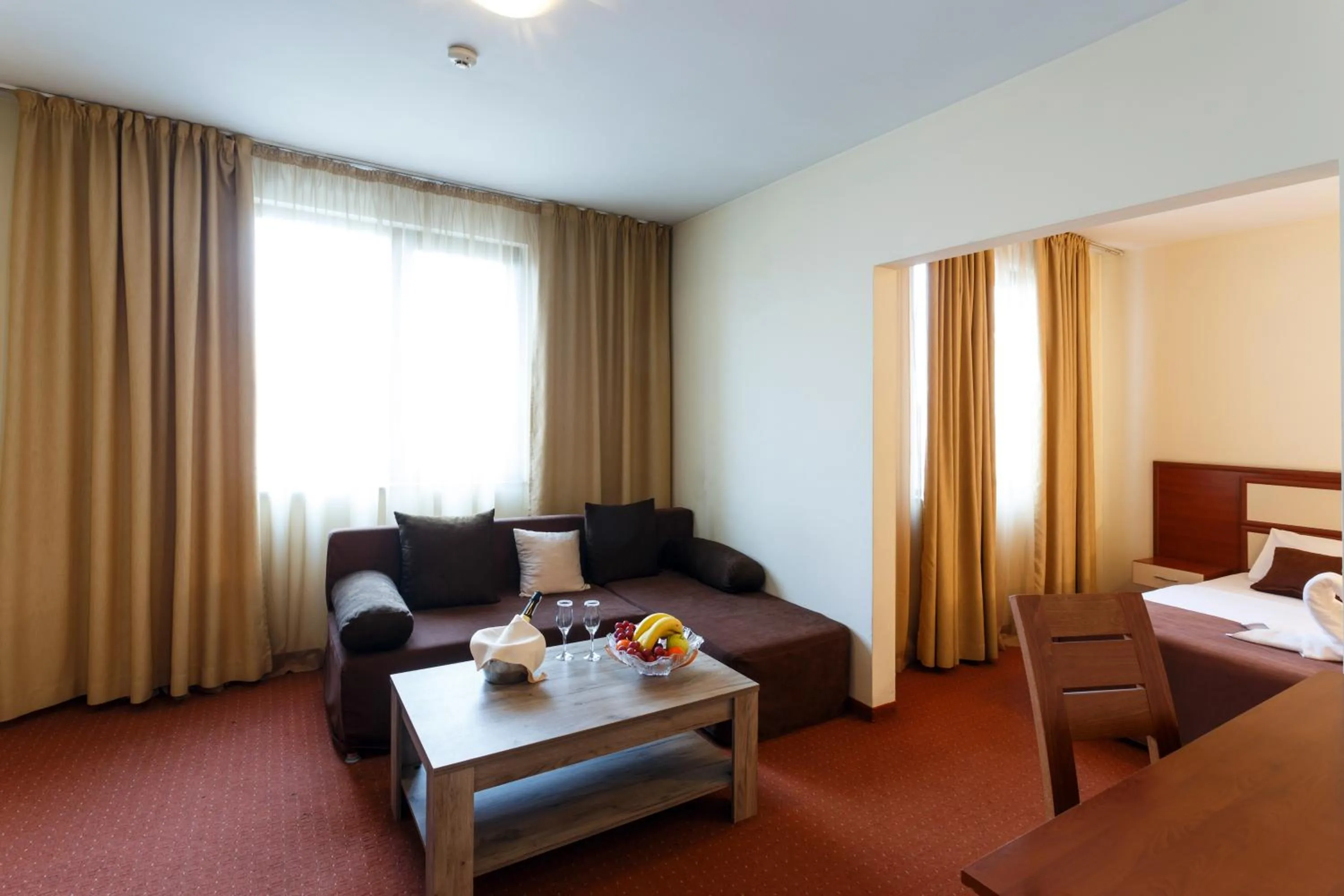 Communal lounge/ TV room, Bed in Nadejda Hotel