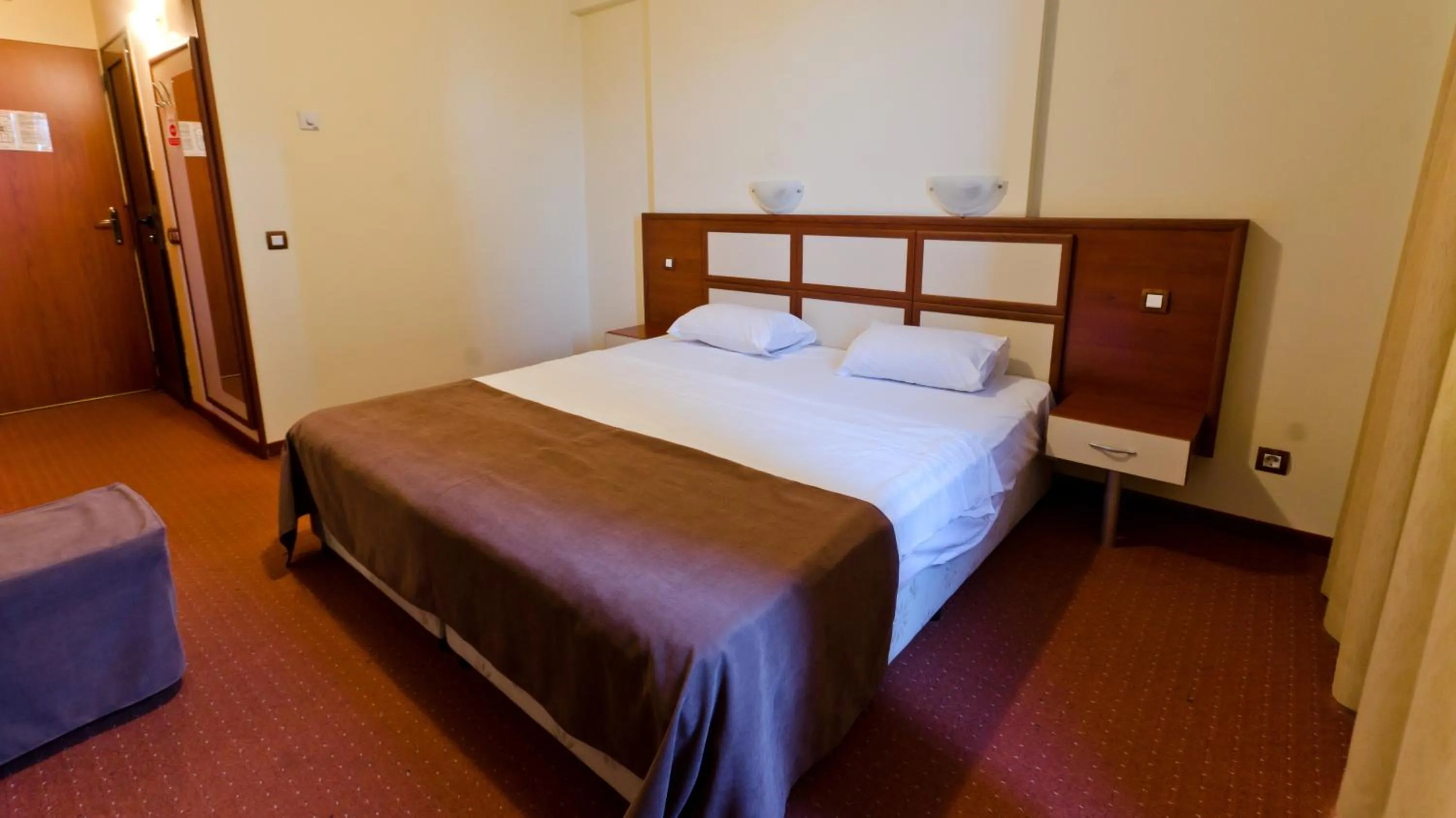 Bed in Nadejda Hotel