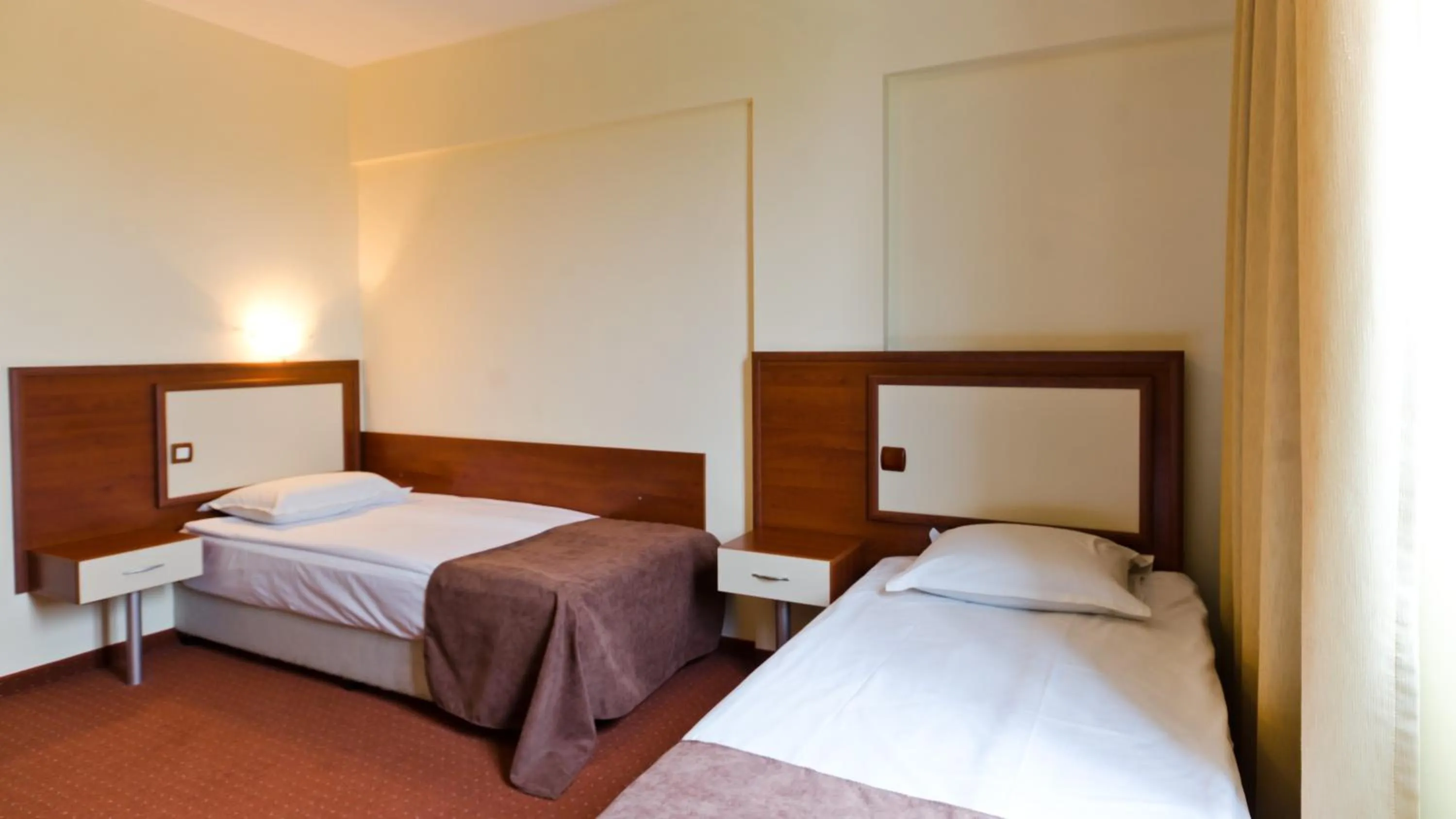 Bed in Nadejda Hotel