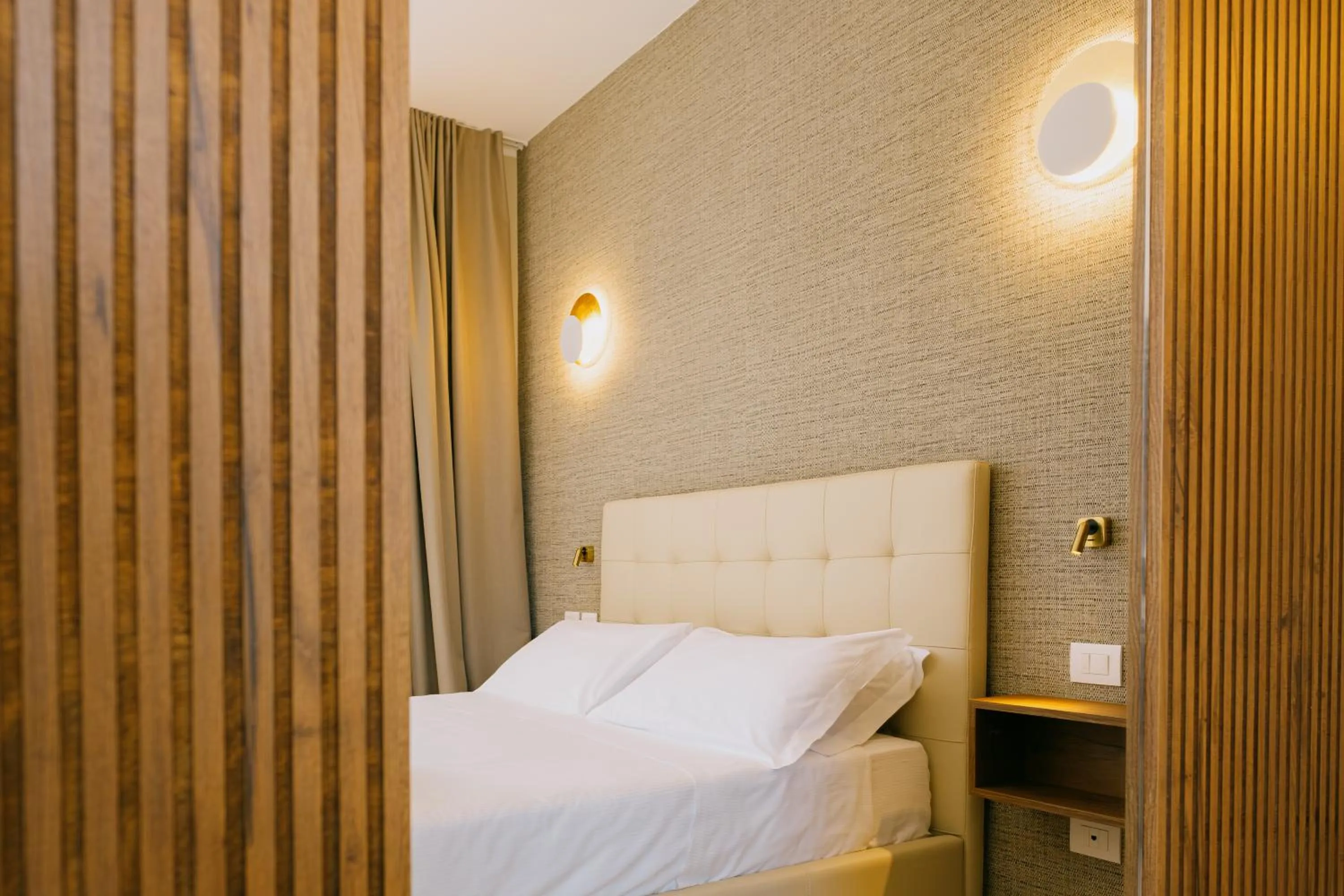 Bed in Hotel Gallia & Resort