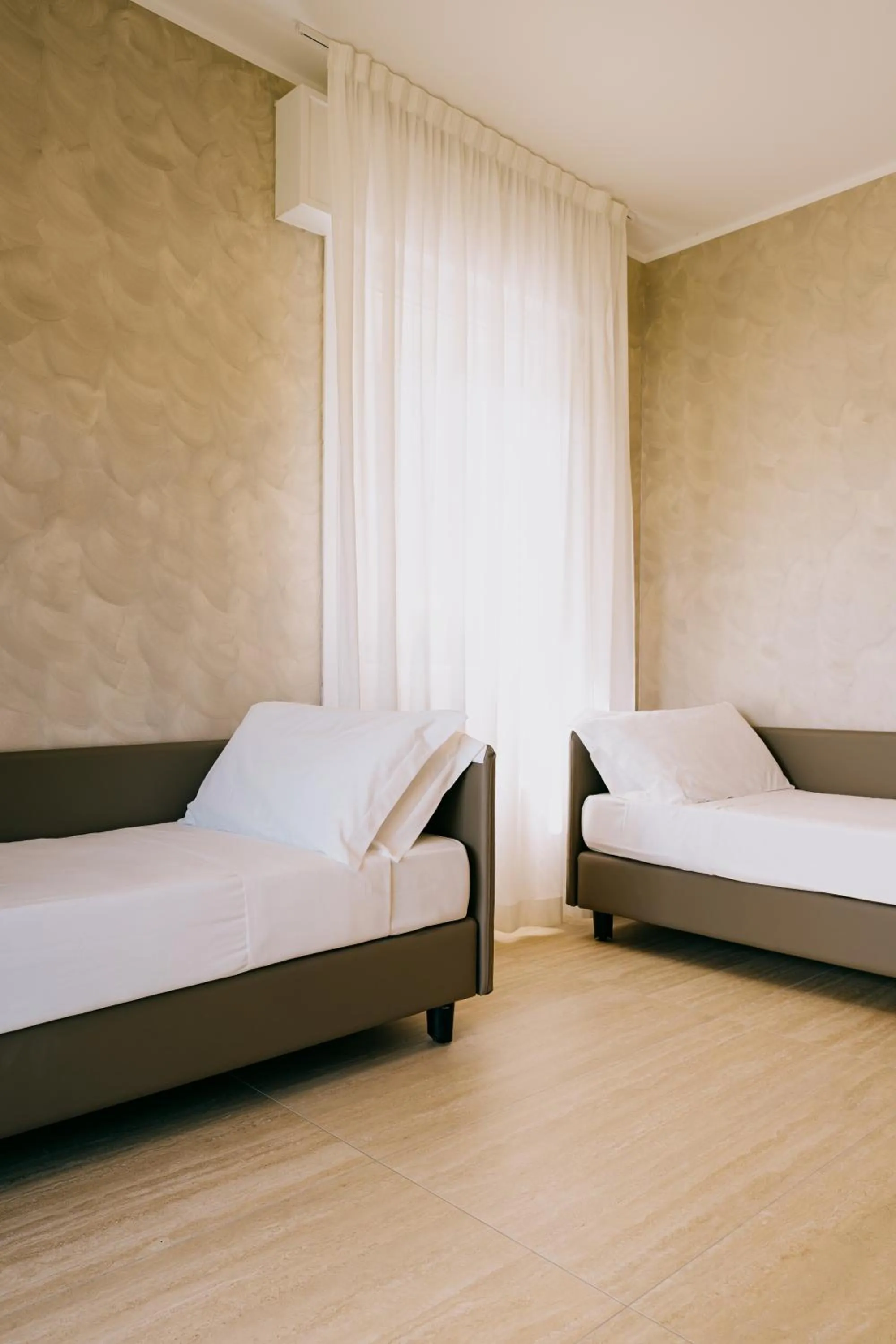 Bed in Hotel Gallia & Resort