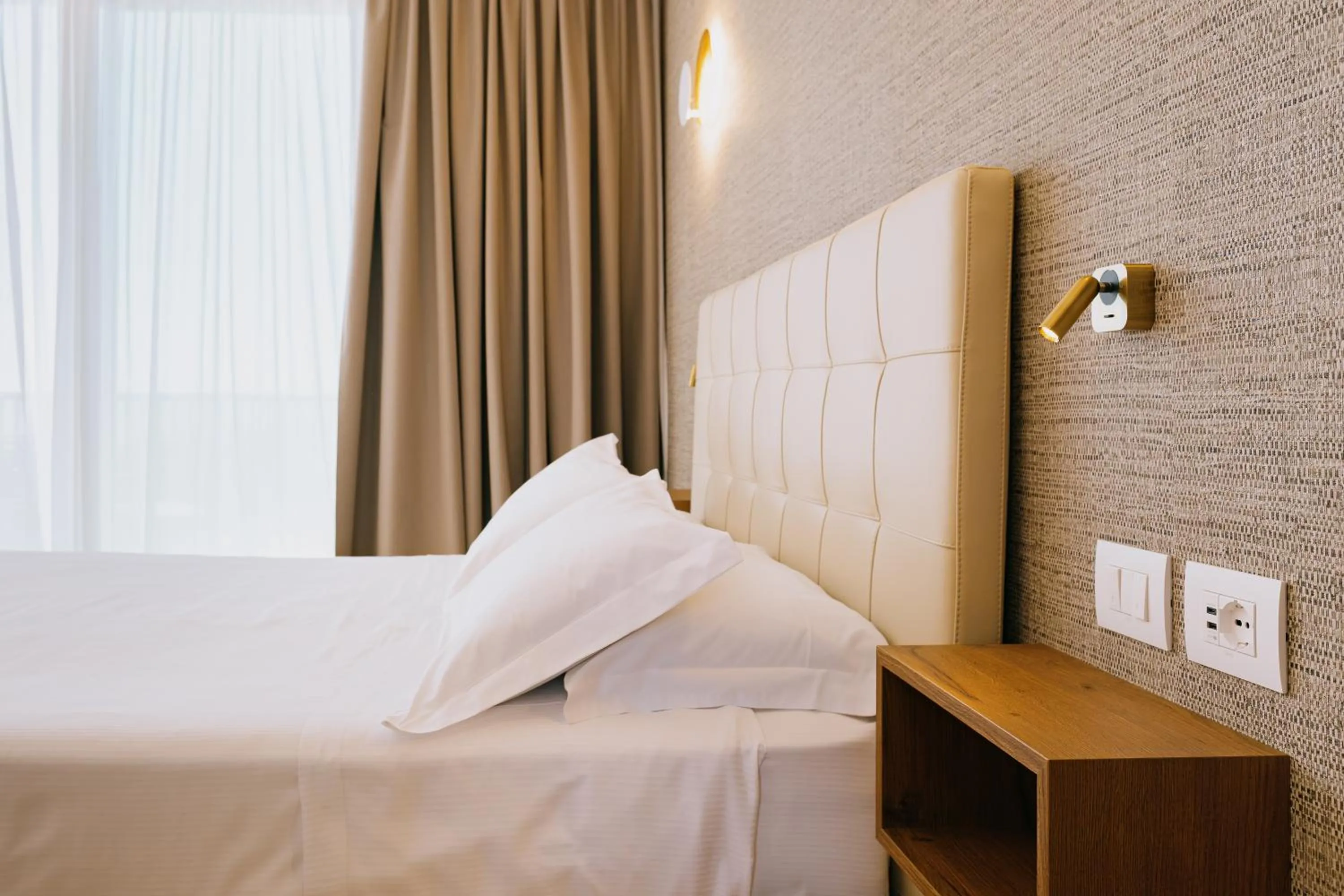 Bed in Hotel Gallia & Resort