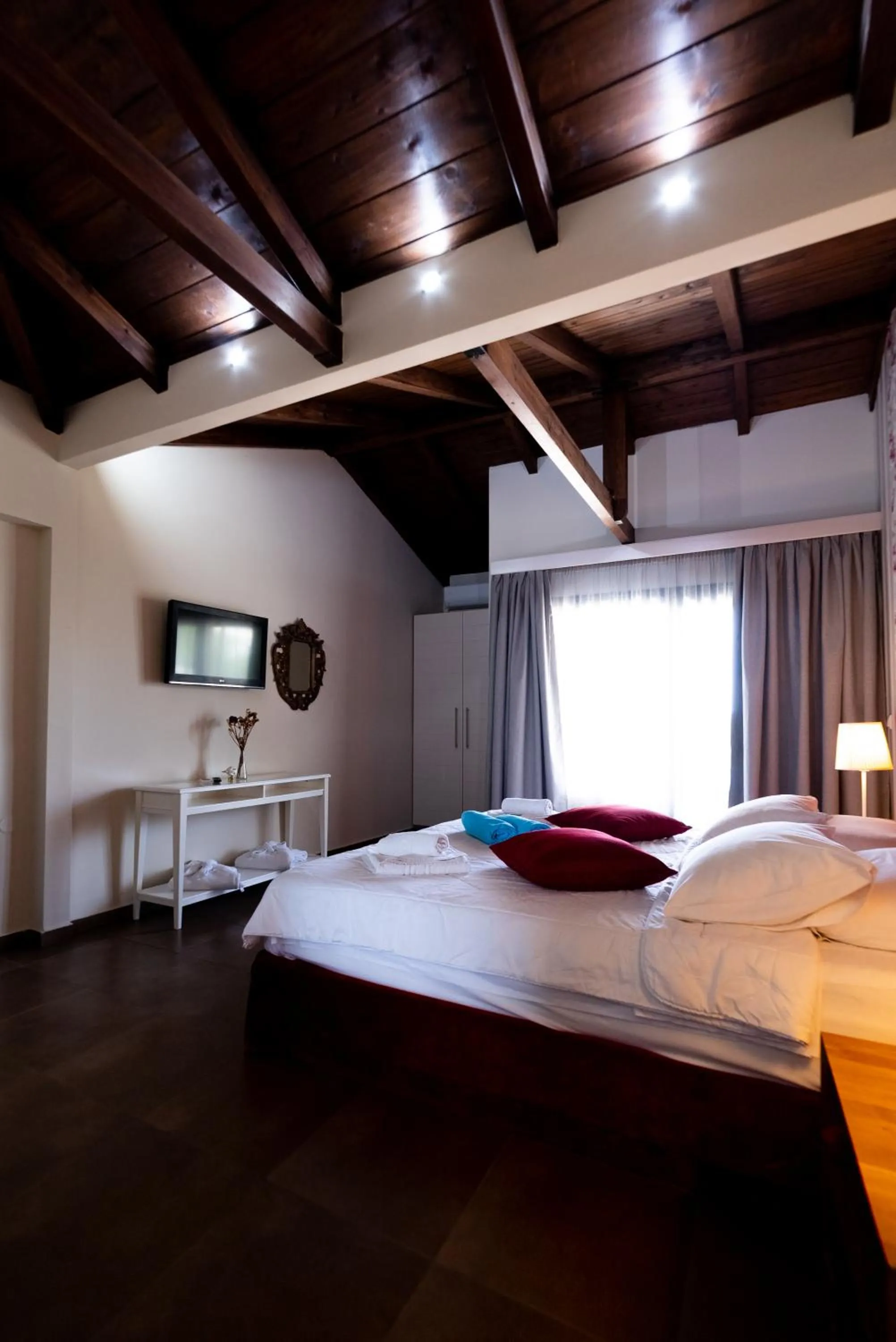 Bed in Ornella Beach Resort & Villas