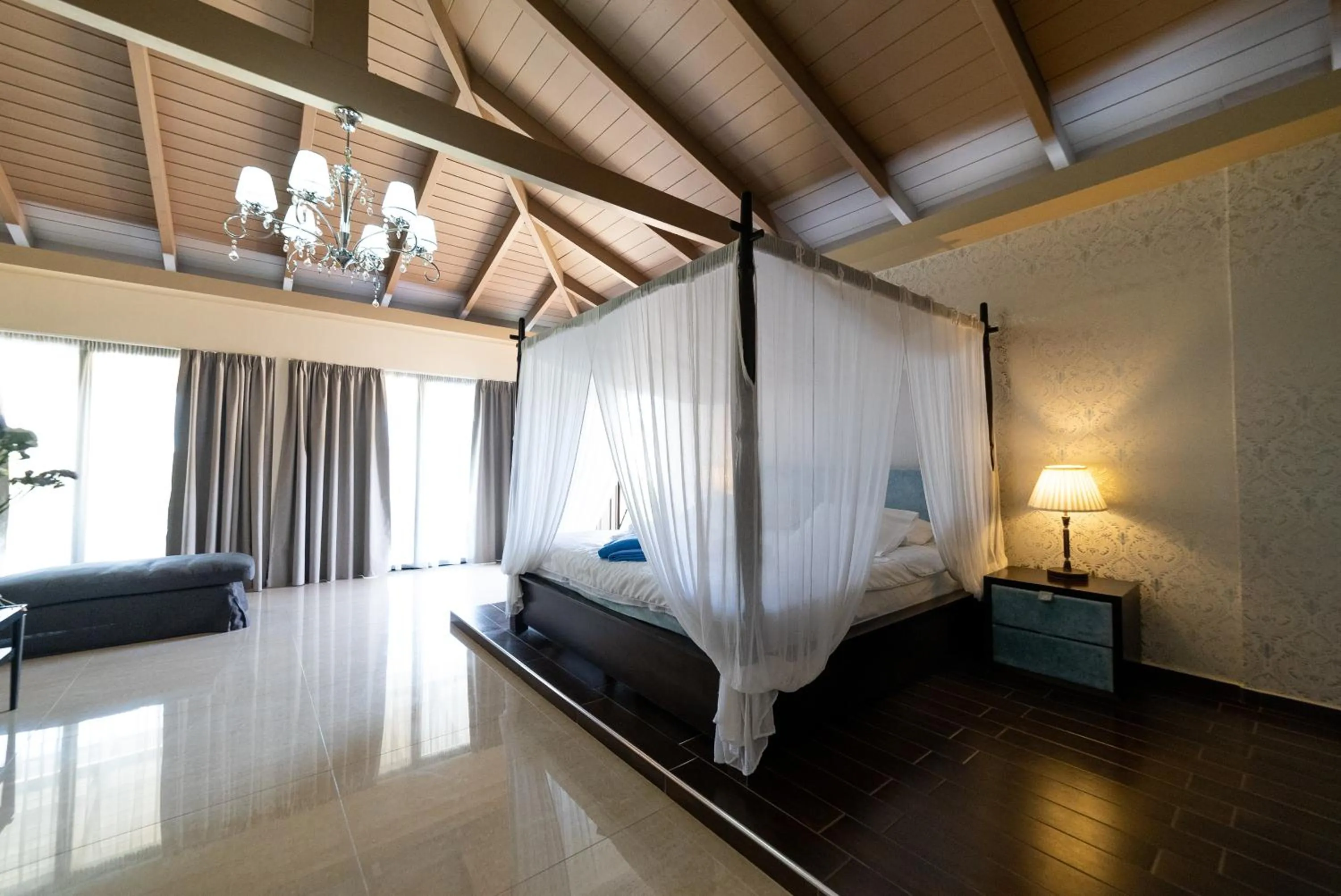 Bed in Ornella Beach Resort & Villas