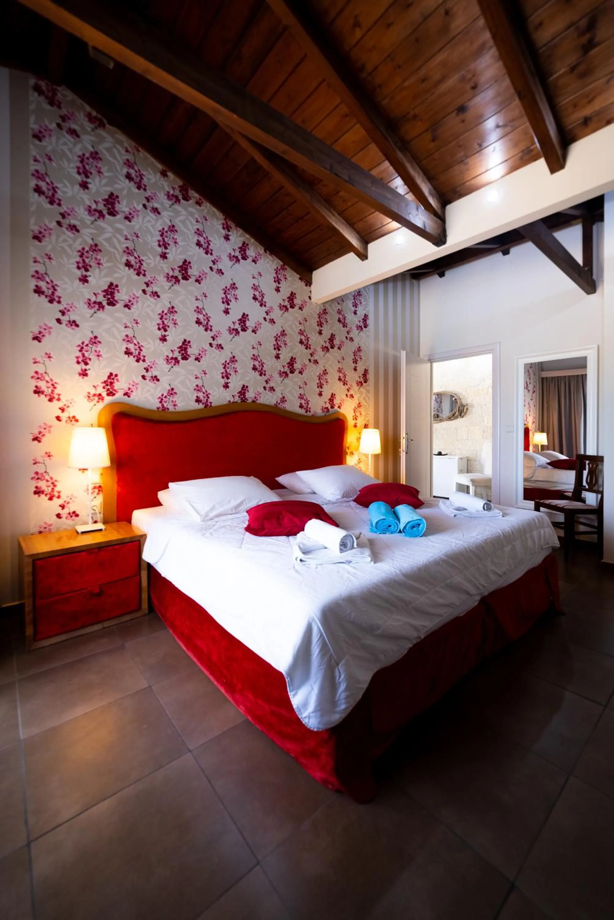 Bed in Ornella Beach Resort & Villas