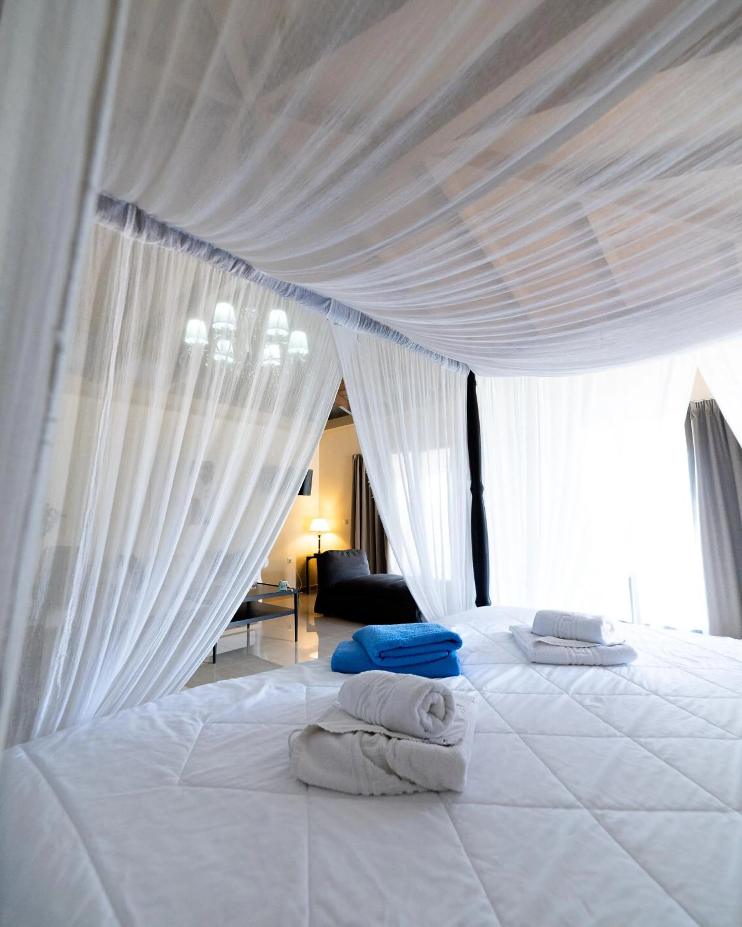 Bed in Ornella Beach Resort & Villas