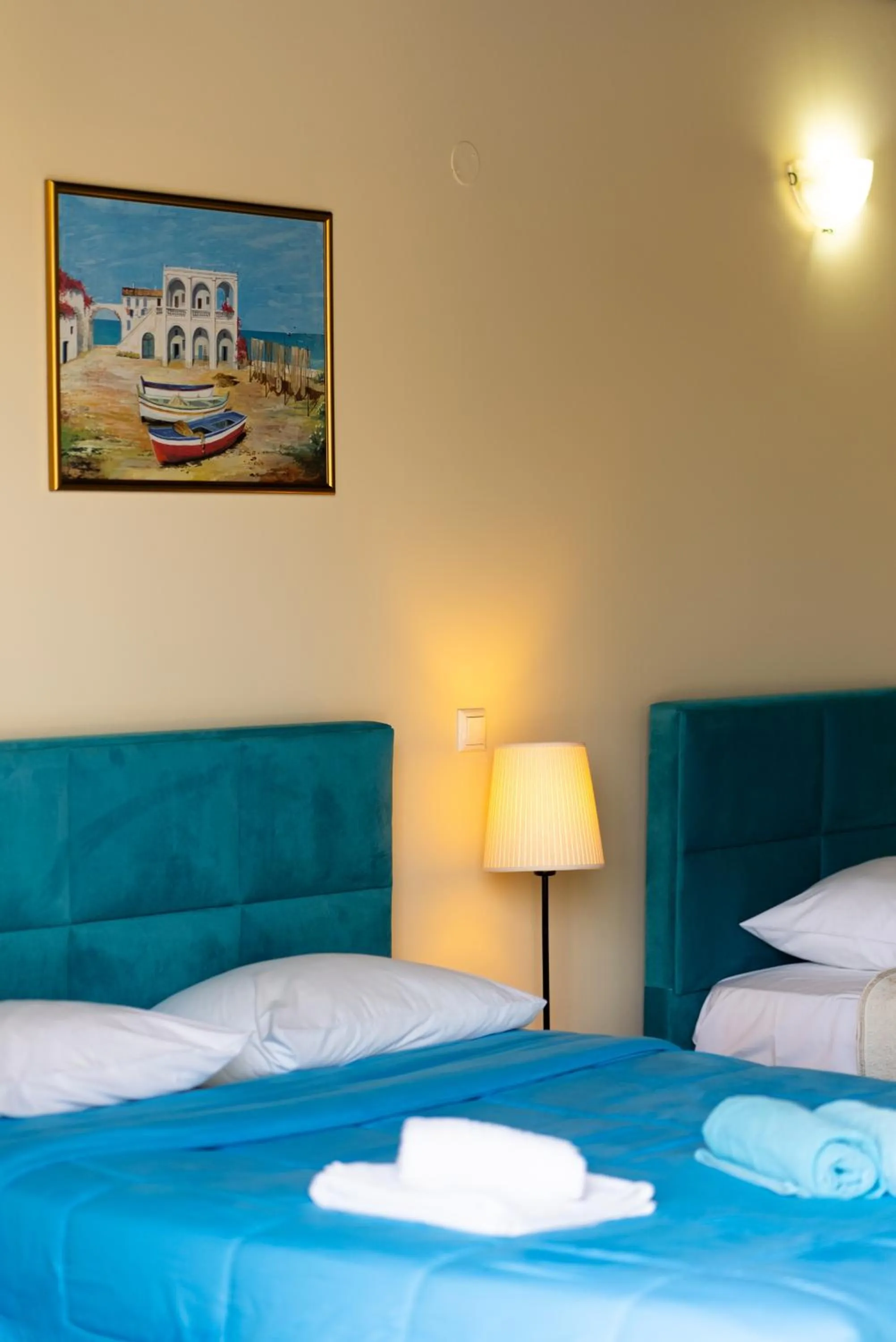 Bed in Ornella Beach Resort & Villas