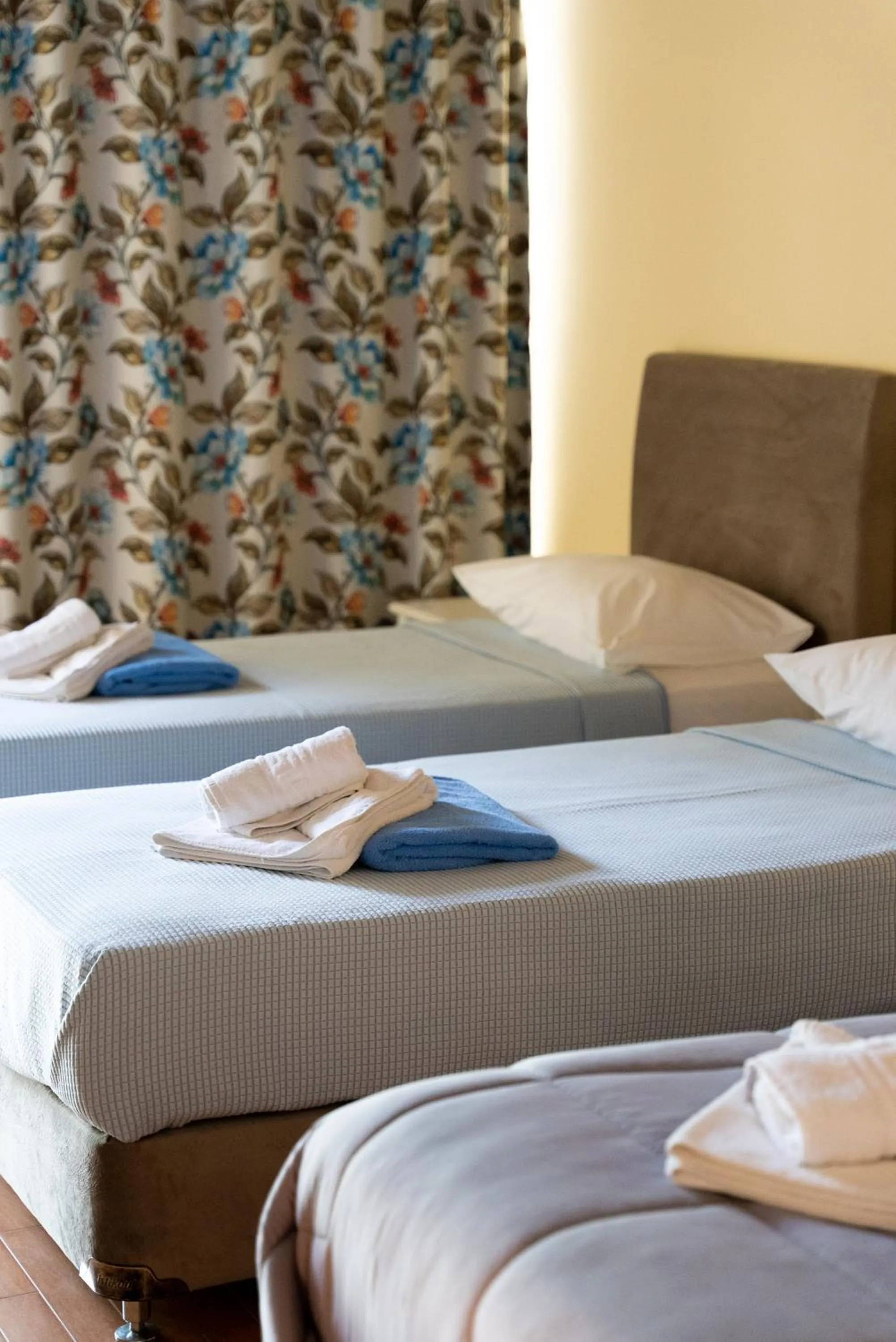 Bed in Ornella Beach Resort & Villas