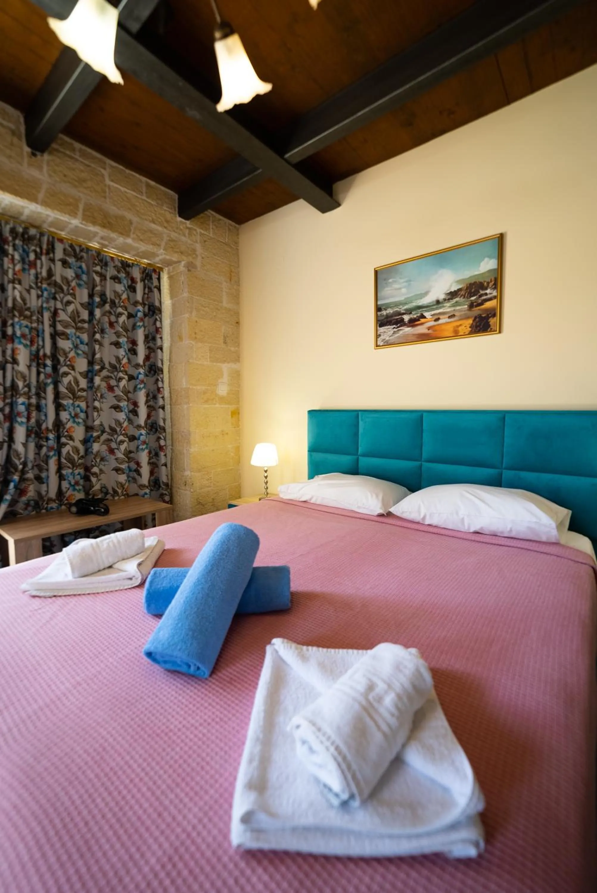 Bed in Ornella Beach Resort & Villas